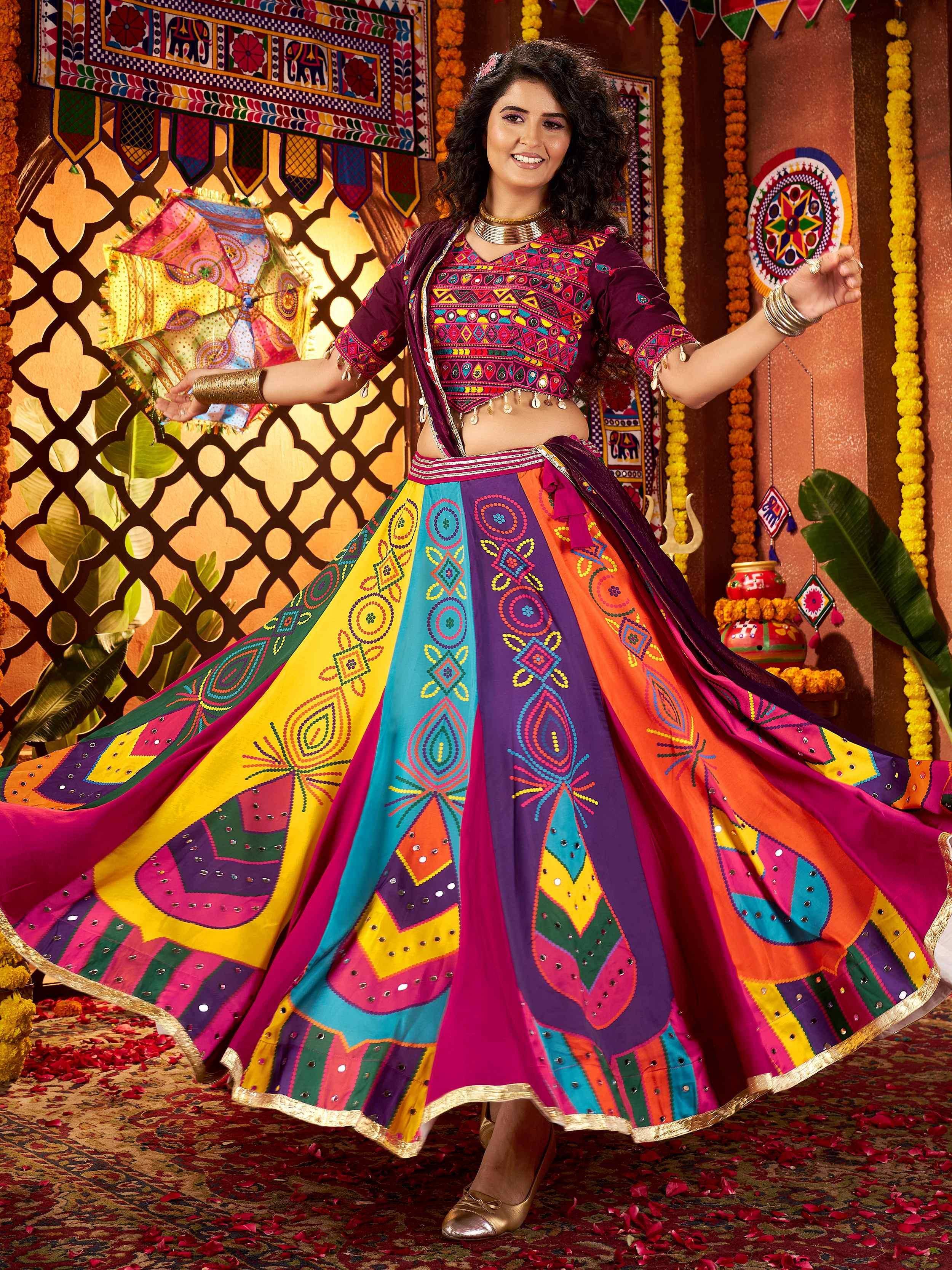 Vibrant Indian ethnic wear: colorful embroidered lehenga choli with mirror work, perfect for festive occasions.