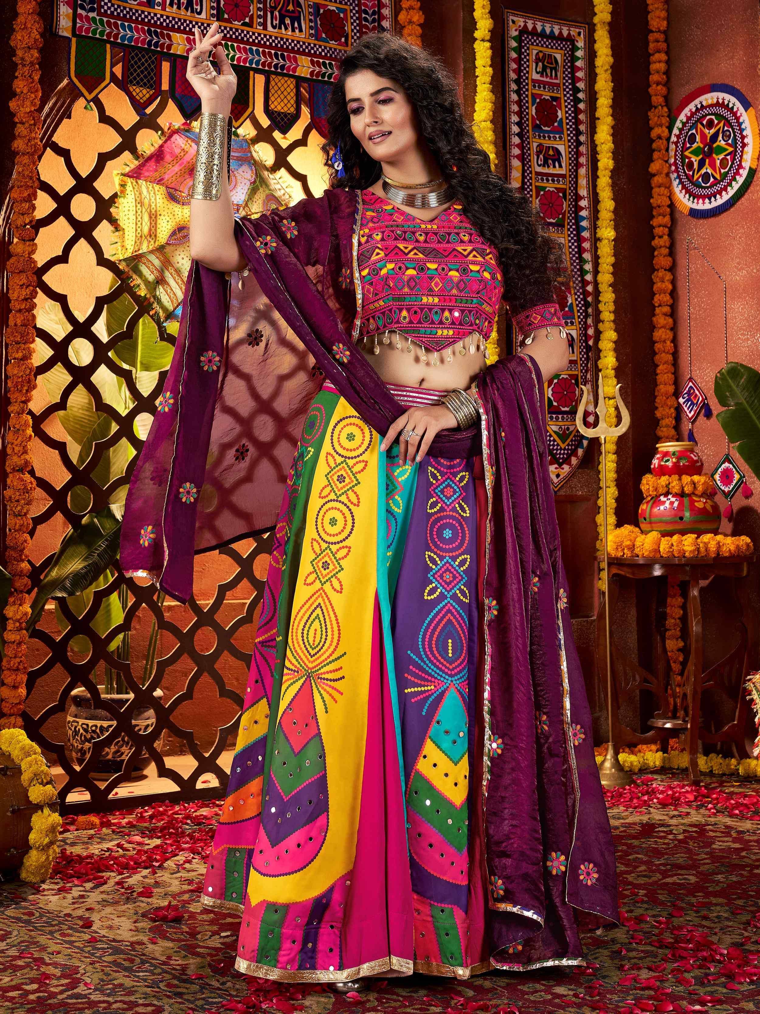 Vibrant Indian ethnic lehenga choli with colorful embroidery and mirror work, perfect for festive occasions.