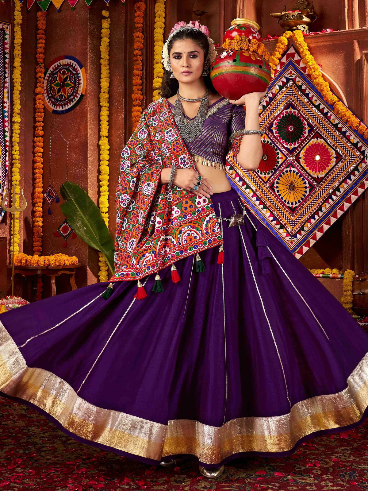 Purple ethnic lehenga choli with mirror work dupatta, festive Indian wear for celebrations
