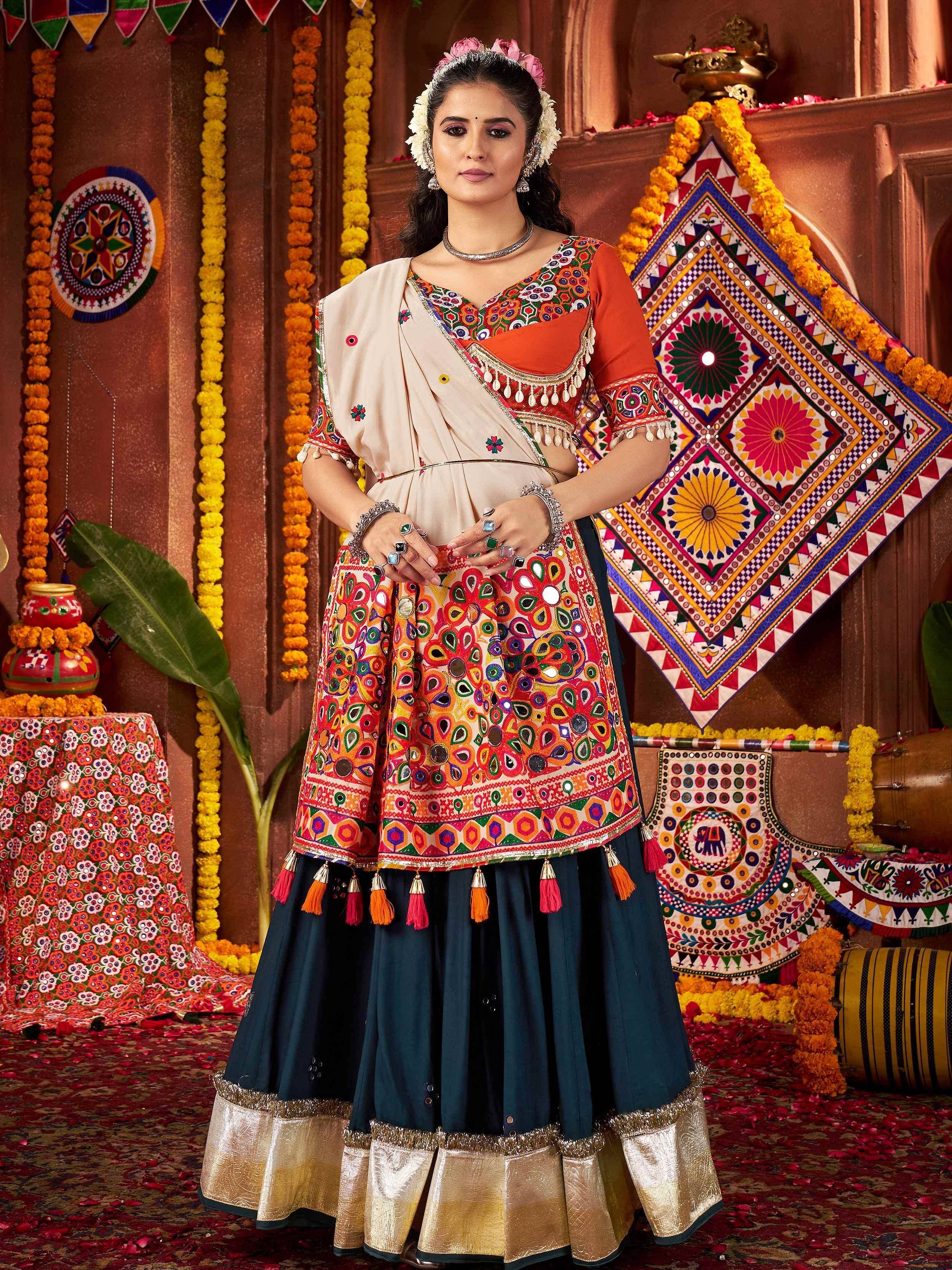 Vibrant Indian ethnic lehenga choli with mirror work, tassels, and floral embroidery for festive occasions