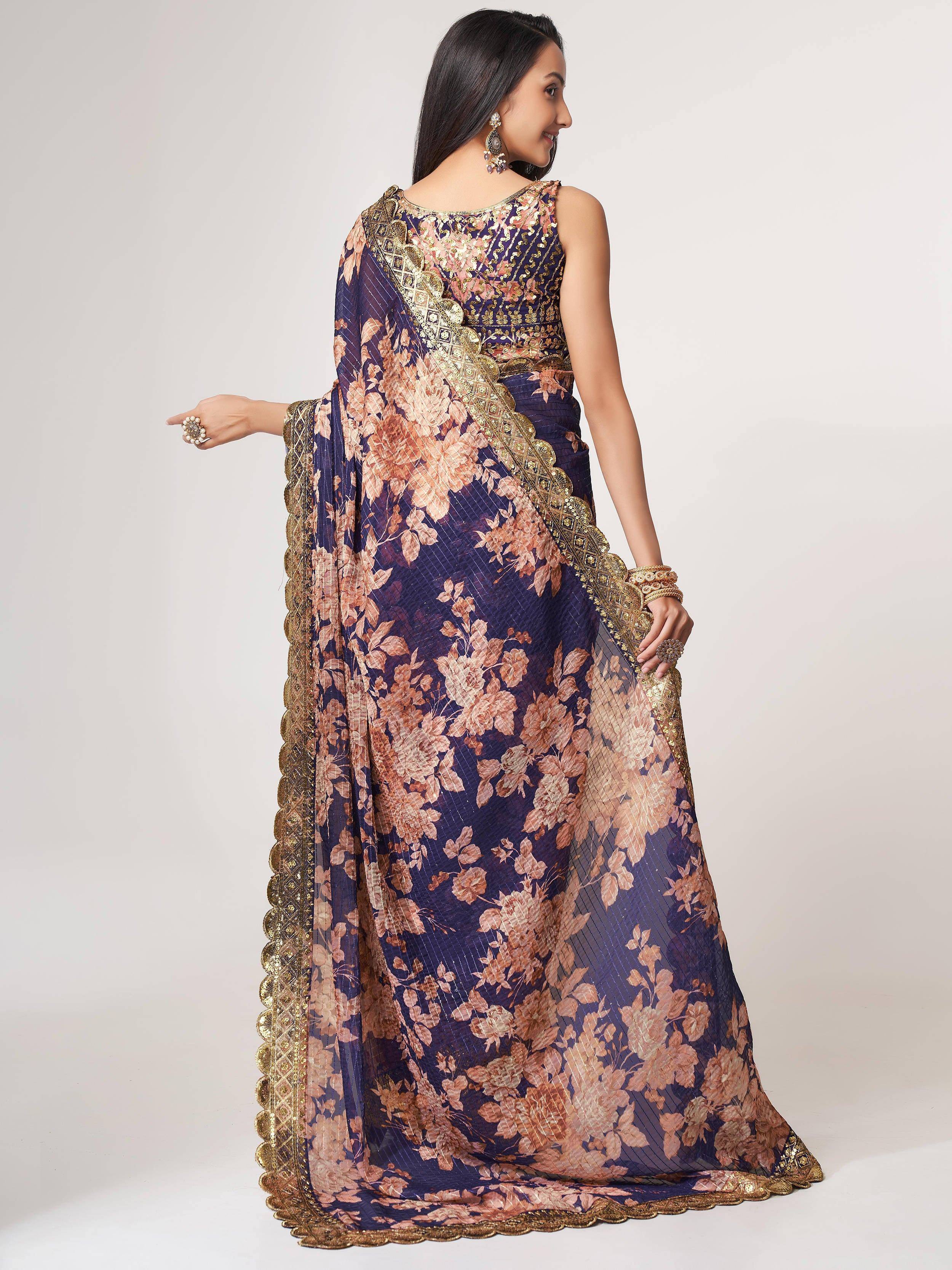 Navy blue floral saree with gold embroidery, elegant Indian ethnic wear for women