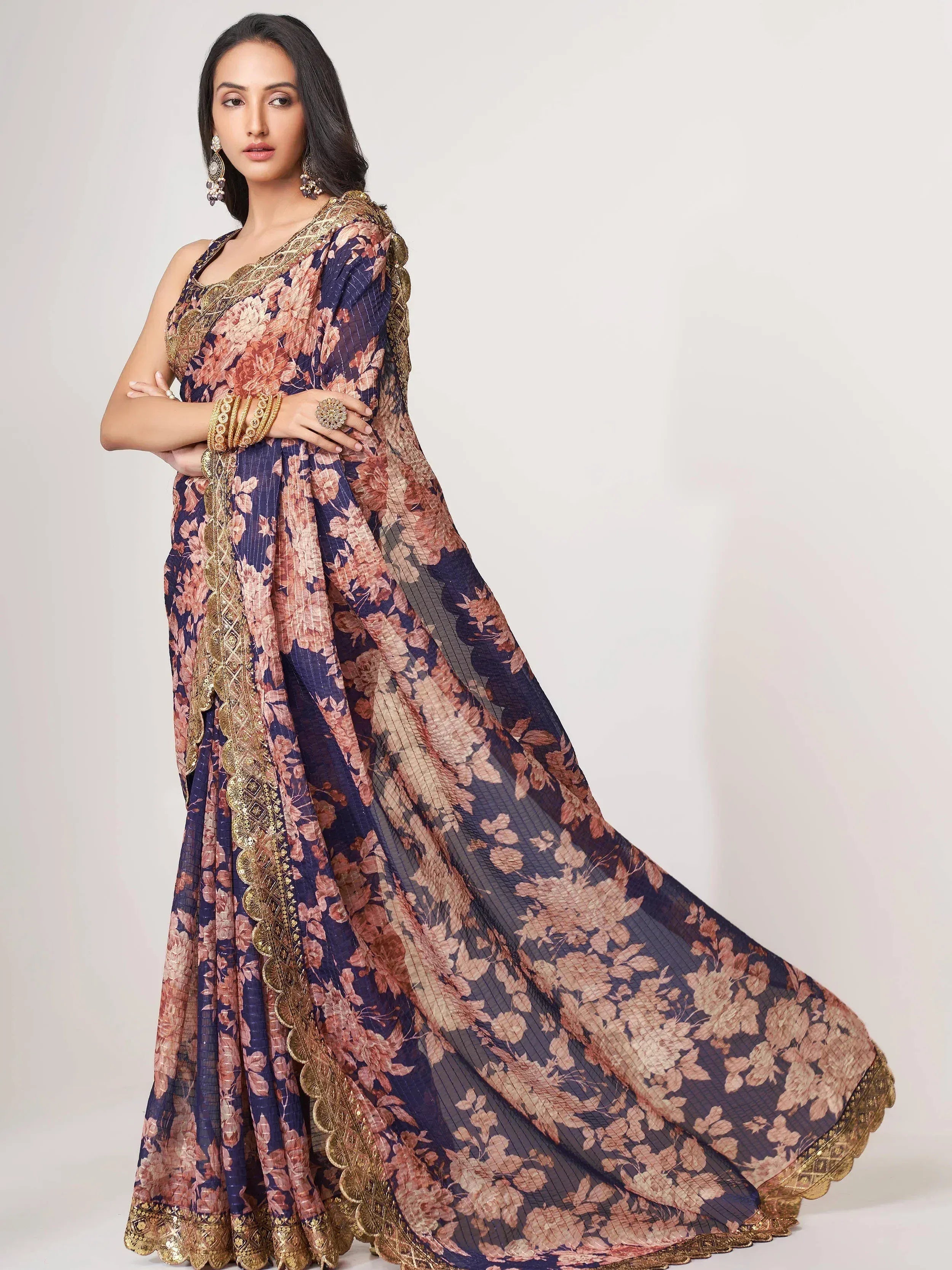 Navy blue floral saree with gold embroidery, elegant Indian ethnic wear for women