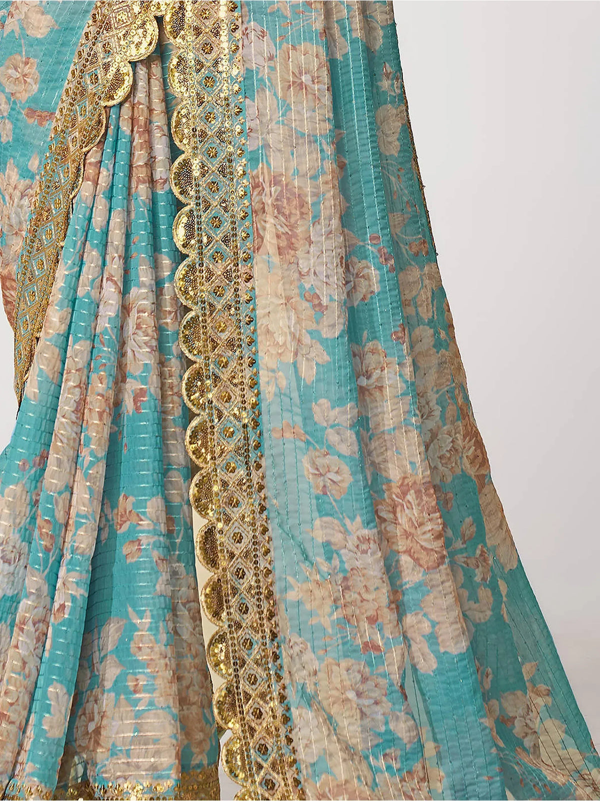 Turquoise floral lehenga with gold embroidery and sequin detailing for Indian ethnic wear