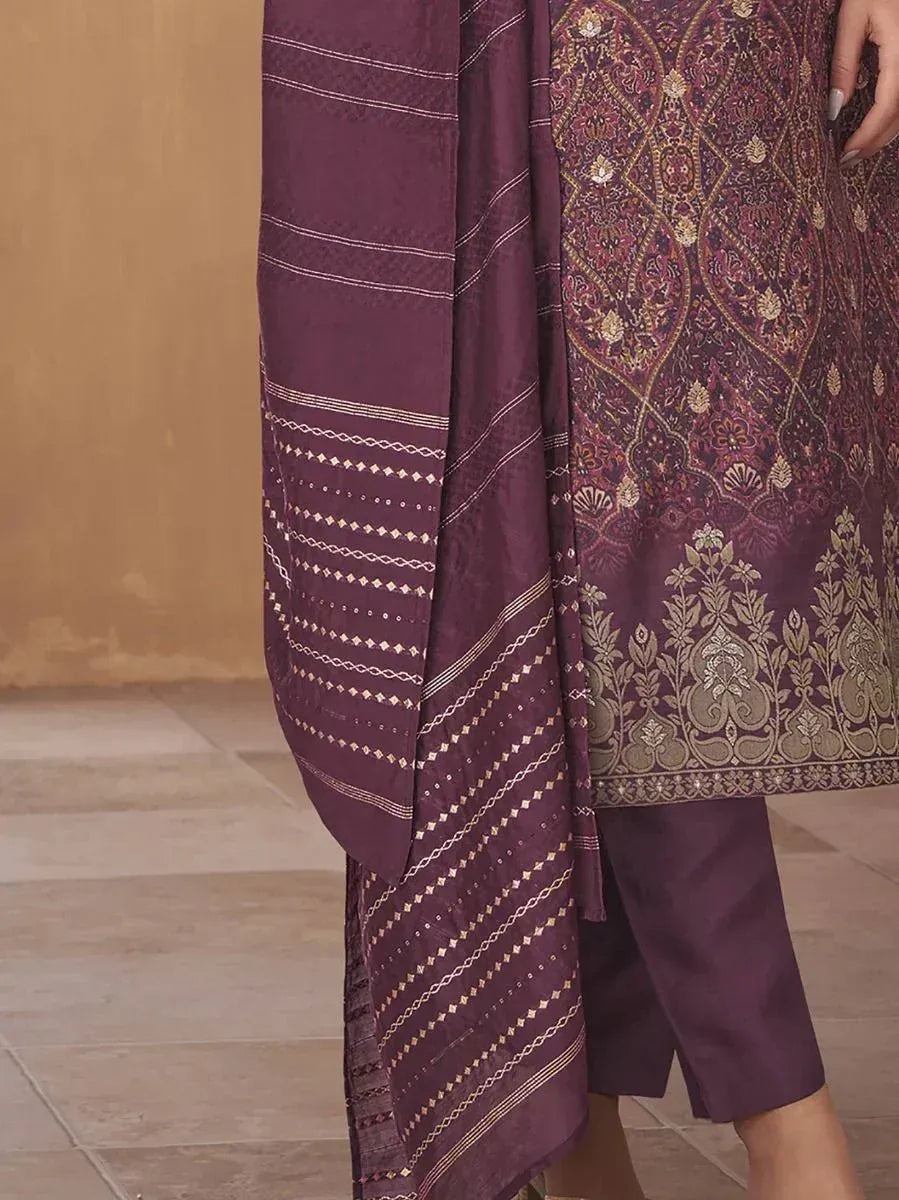 Purple ethnic salwar kameez with gold embroidery and patterned dupatta, perfect for festive occasions