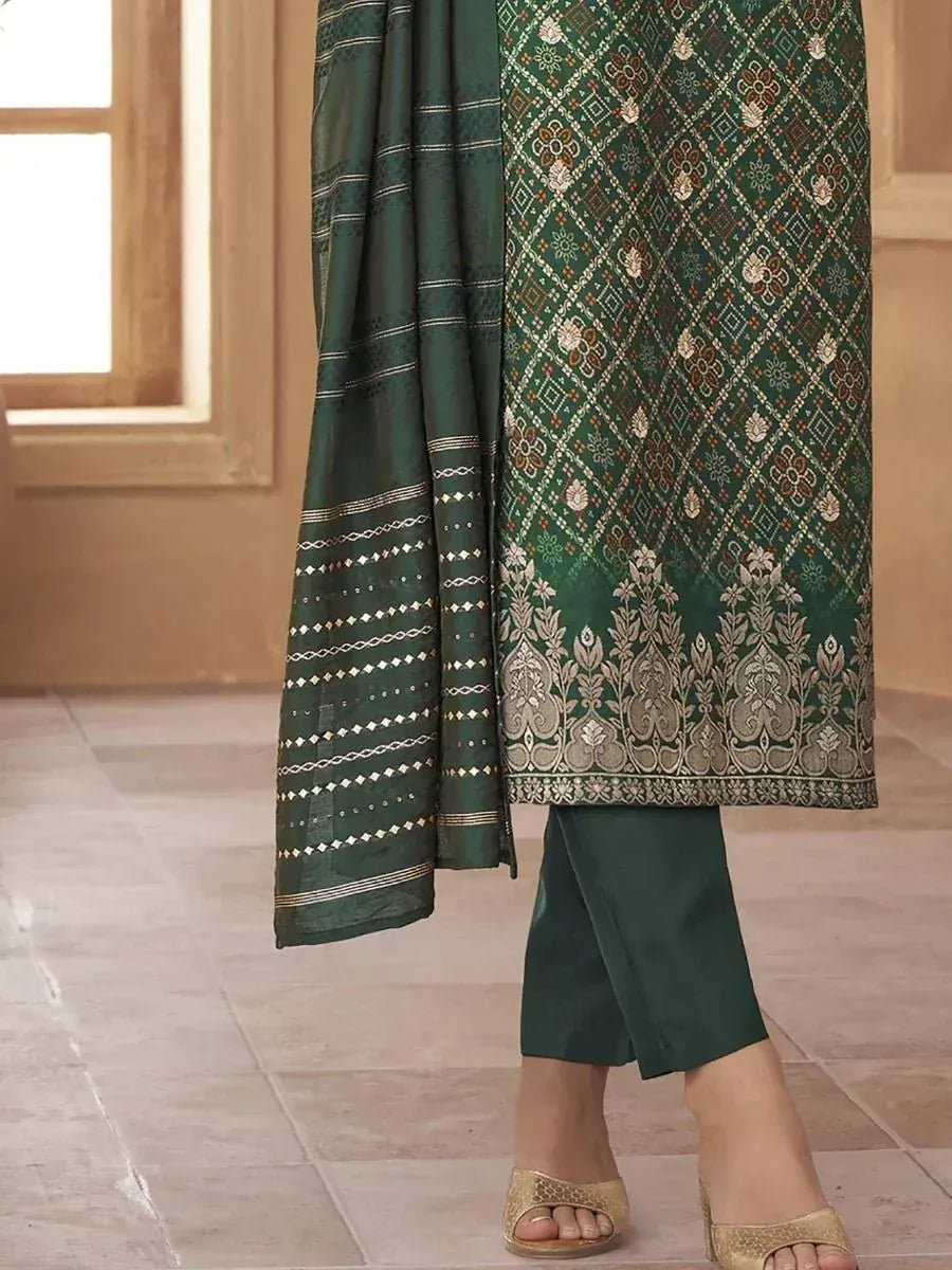Emerald green embroidered salwar kameez with matching dupatta and pants, perfect for ethnic occasions