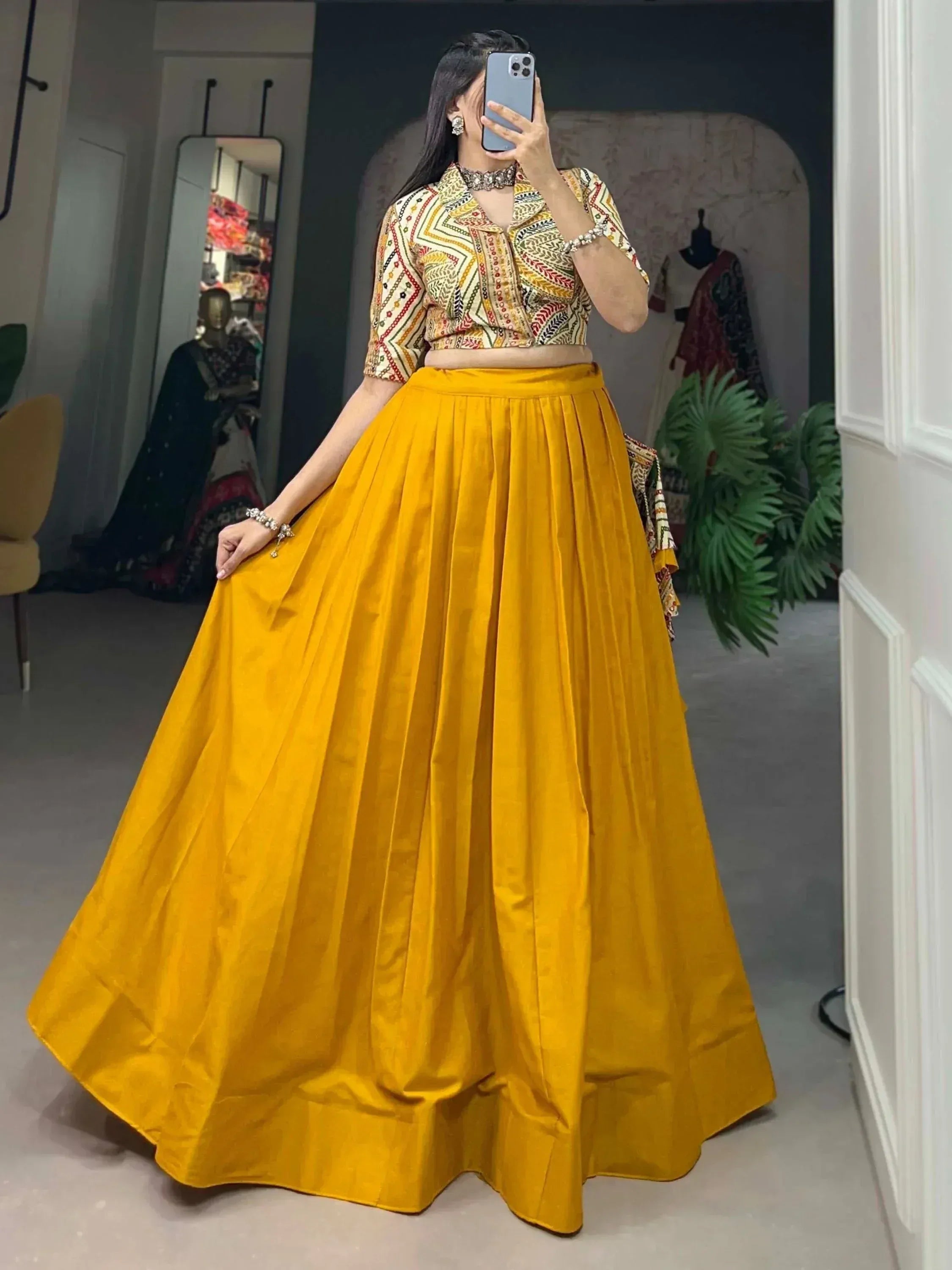 Yellow pleated lehenga with printed crop top, Indian ethnic wear for women