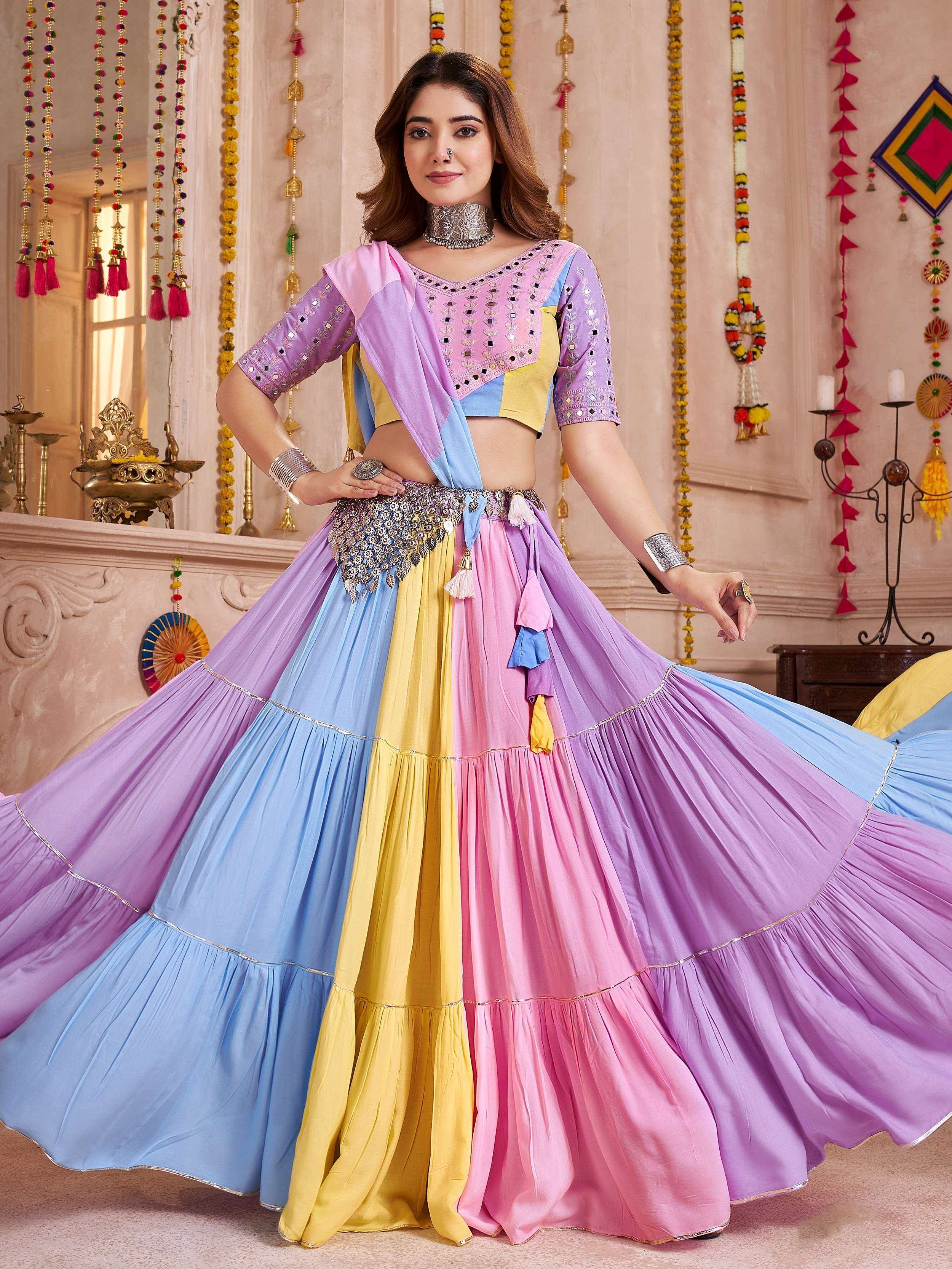 Colorful Indian lehenga choli with mirror work, perfect for festive occasions and celebrations.