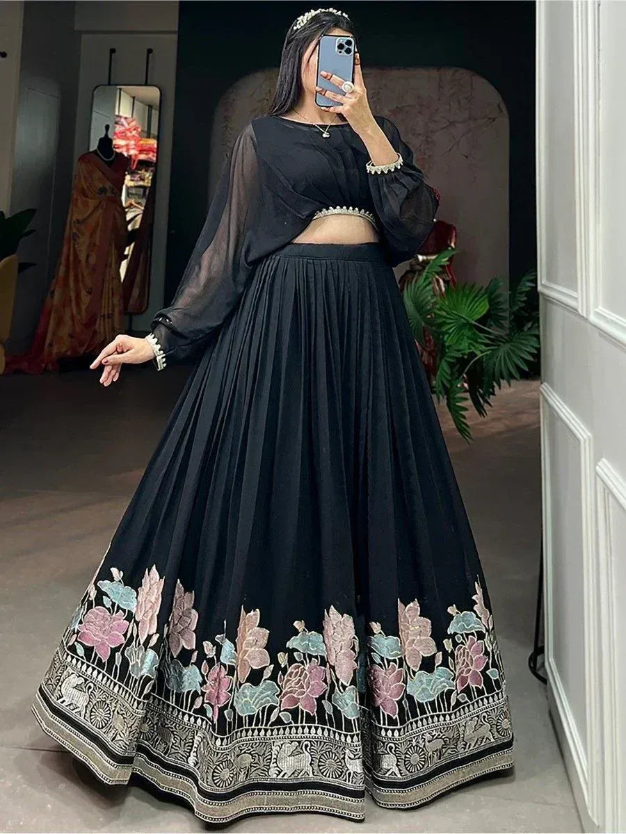 Black floral embroidered lehenga choli with sheer sleeves, perfect for Indian ethnic occasions