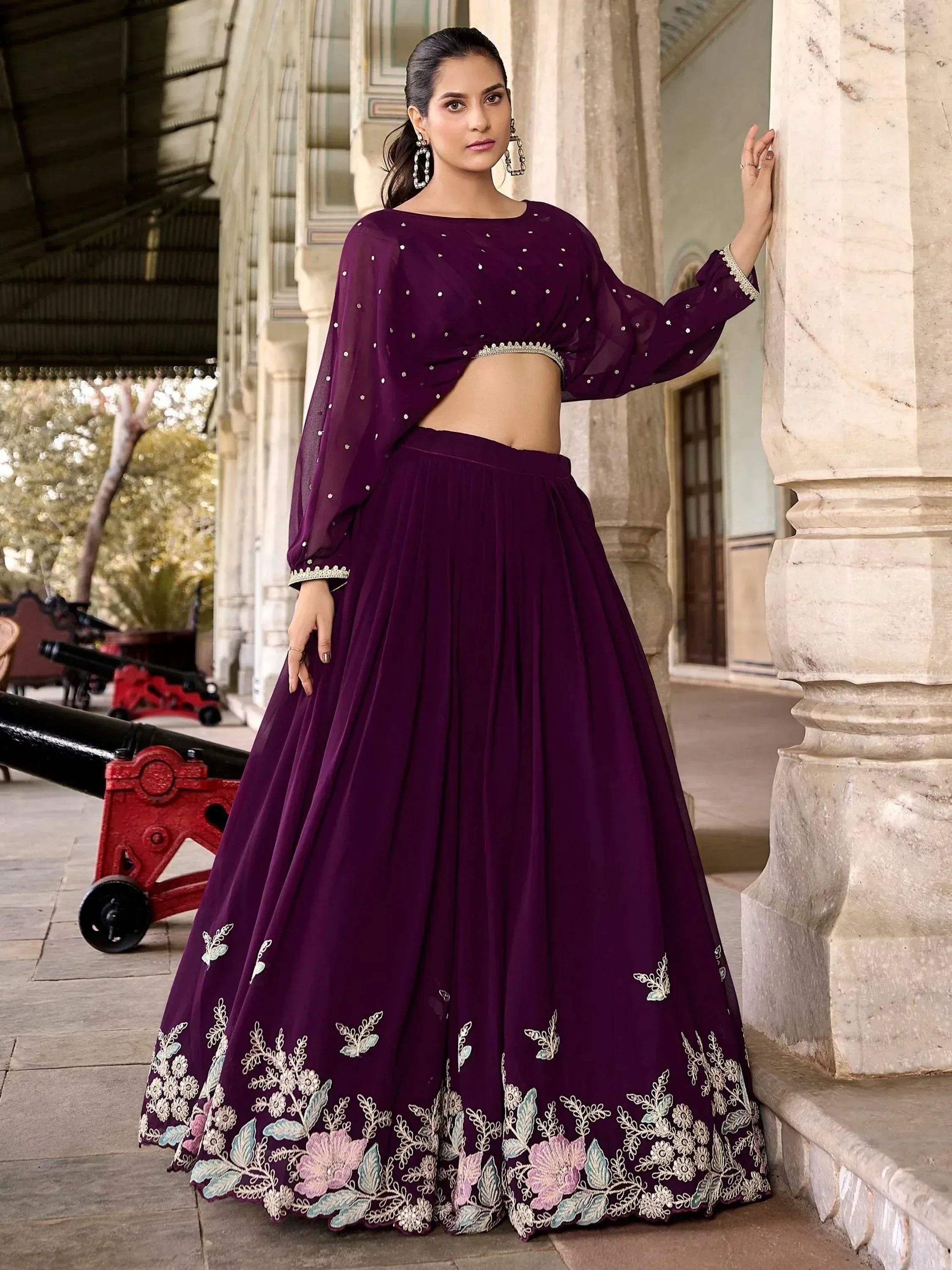 Purple designer lehenga choli with floral embroidery, perfect for Indian ethnic wear events