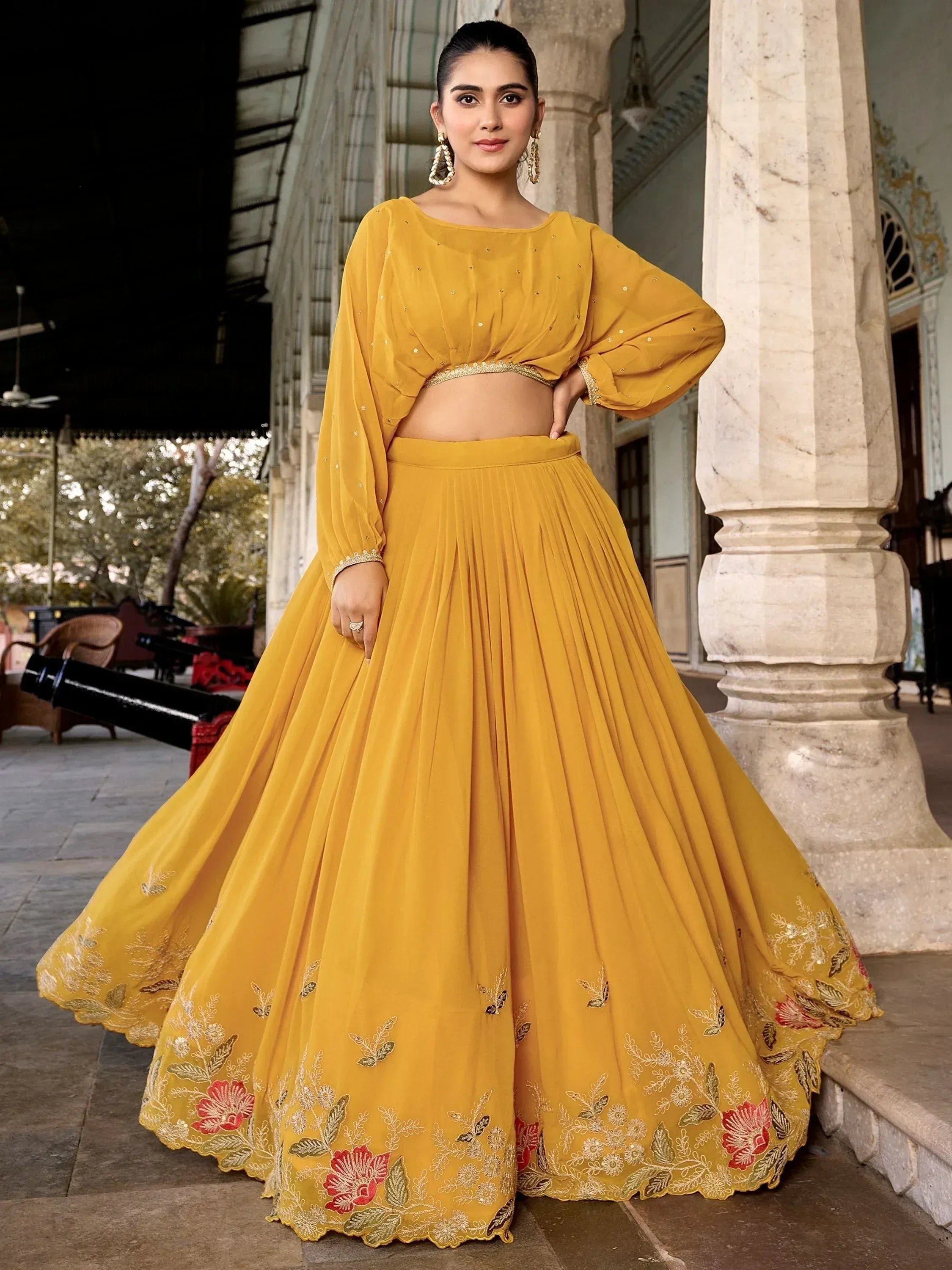 Mustard yellow designer lehenga choli with floral embroidery, perfect for Indian ethnic occasions