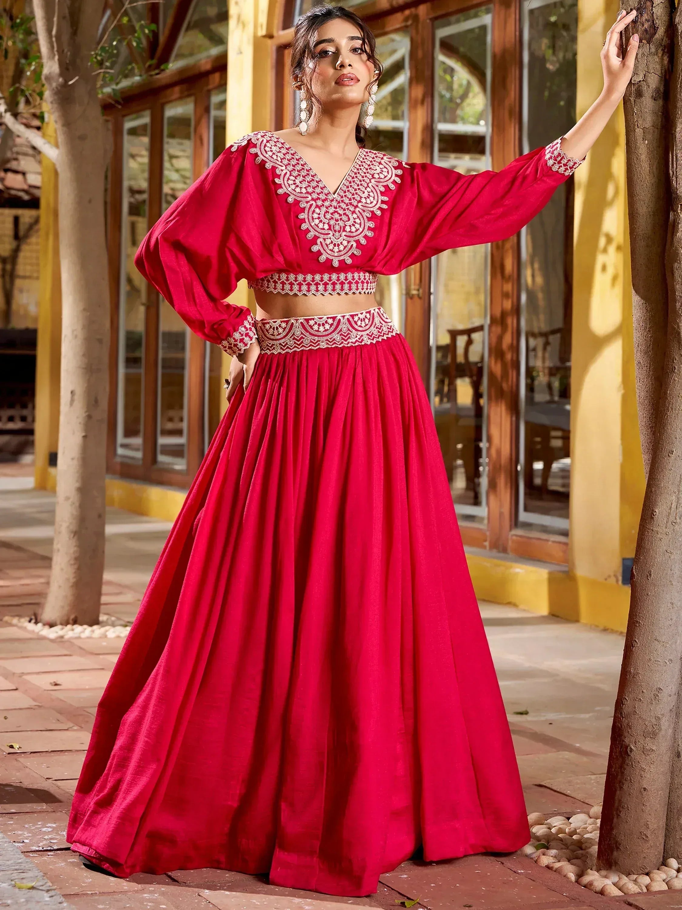 Red embroidered lehenga choli with V-neck blouse, perfect for Indian ethnic wear occasions