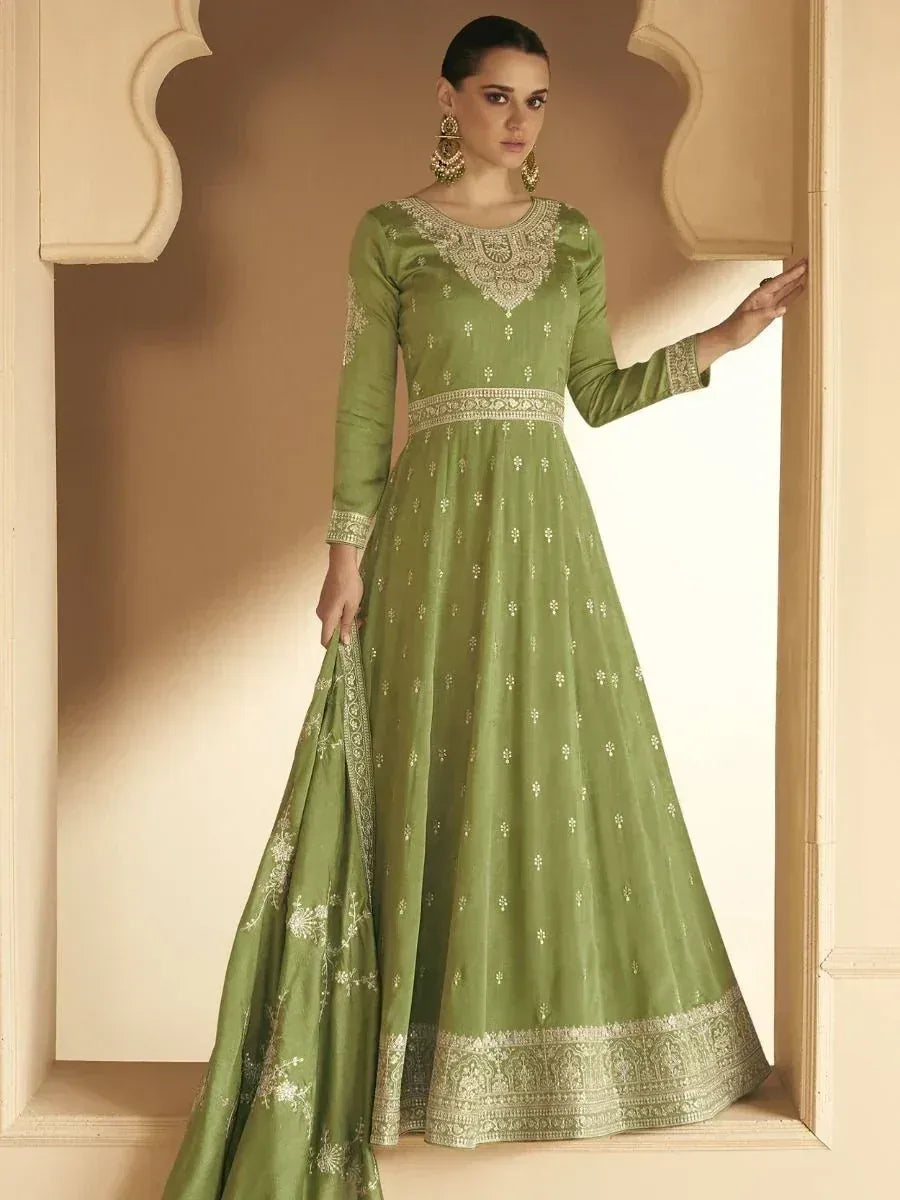 Olive green embroidered anarkali gown with gold detailing, perfect for Indian ethnic occasions