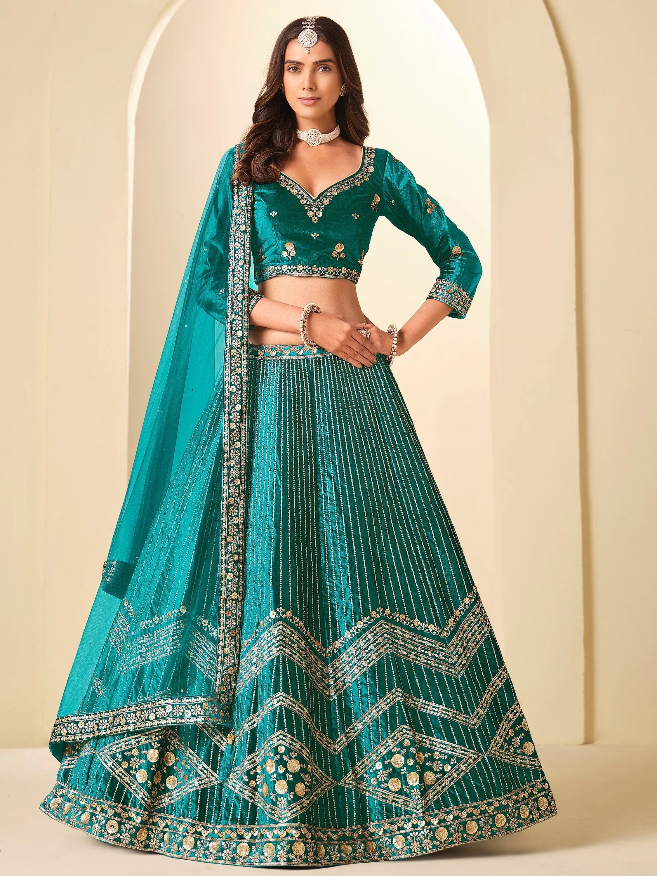 Graceful Teal Blue Embroidered Velvet Reception Wear Lehenga Choli
