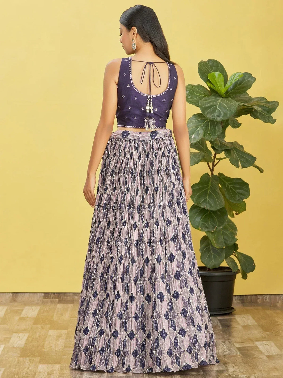 Purple embroidered lehenga choli with pleated skirt, back view, Indian ethnic wear