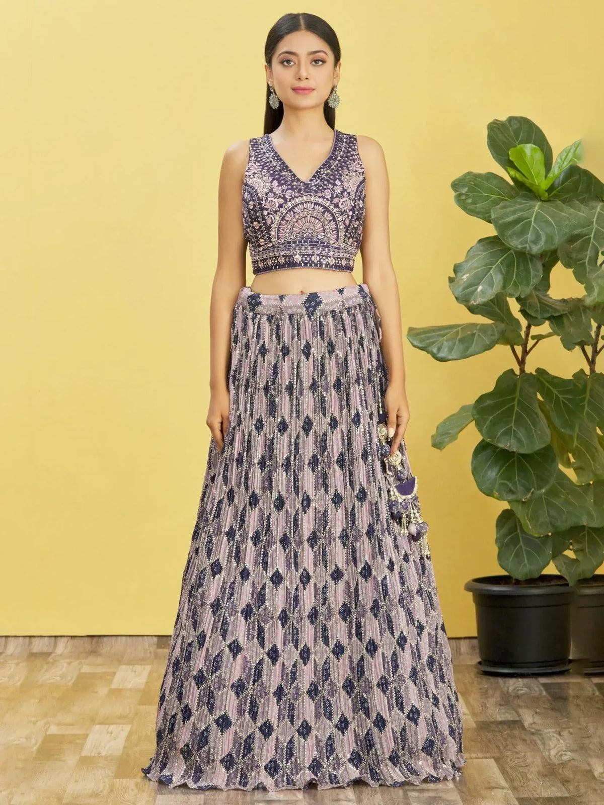 Purple and pink embroidered lehenga choli with pleated skirt and tassels, Indian ethnic wear