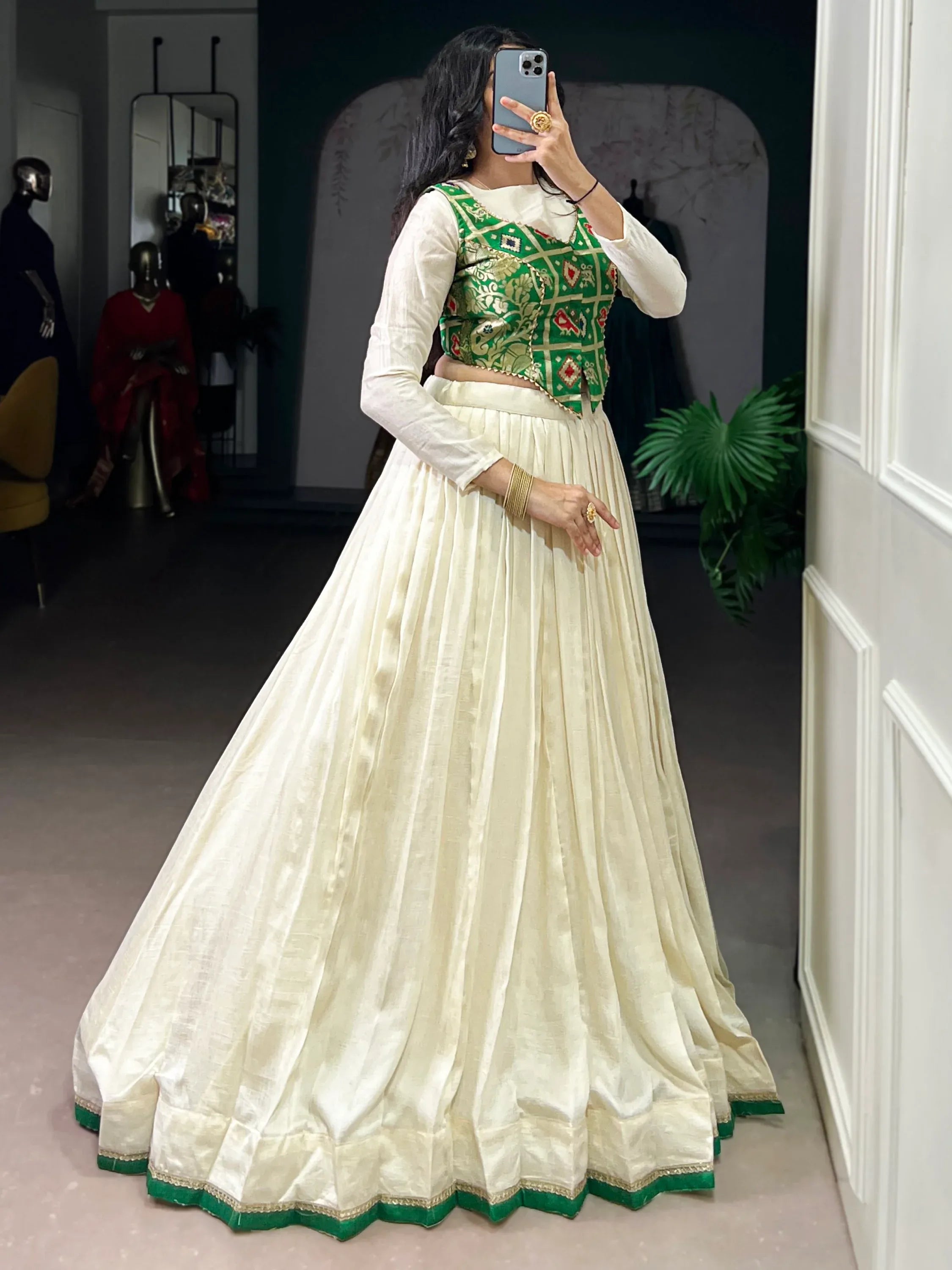 Regal Off-White Lace Work Silk Festive Wear Crop Top Lehenga With Koti