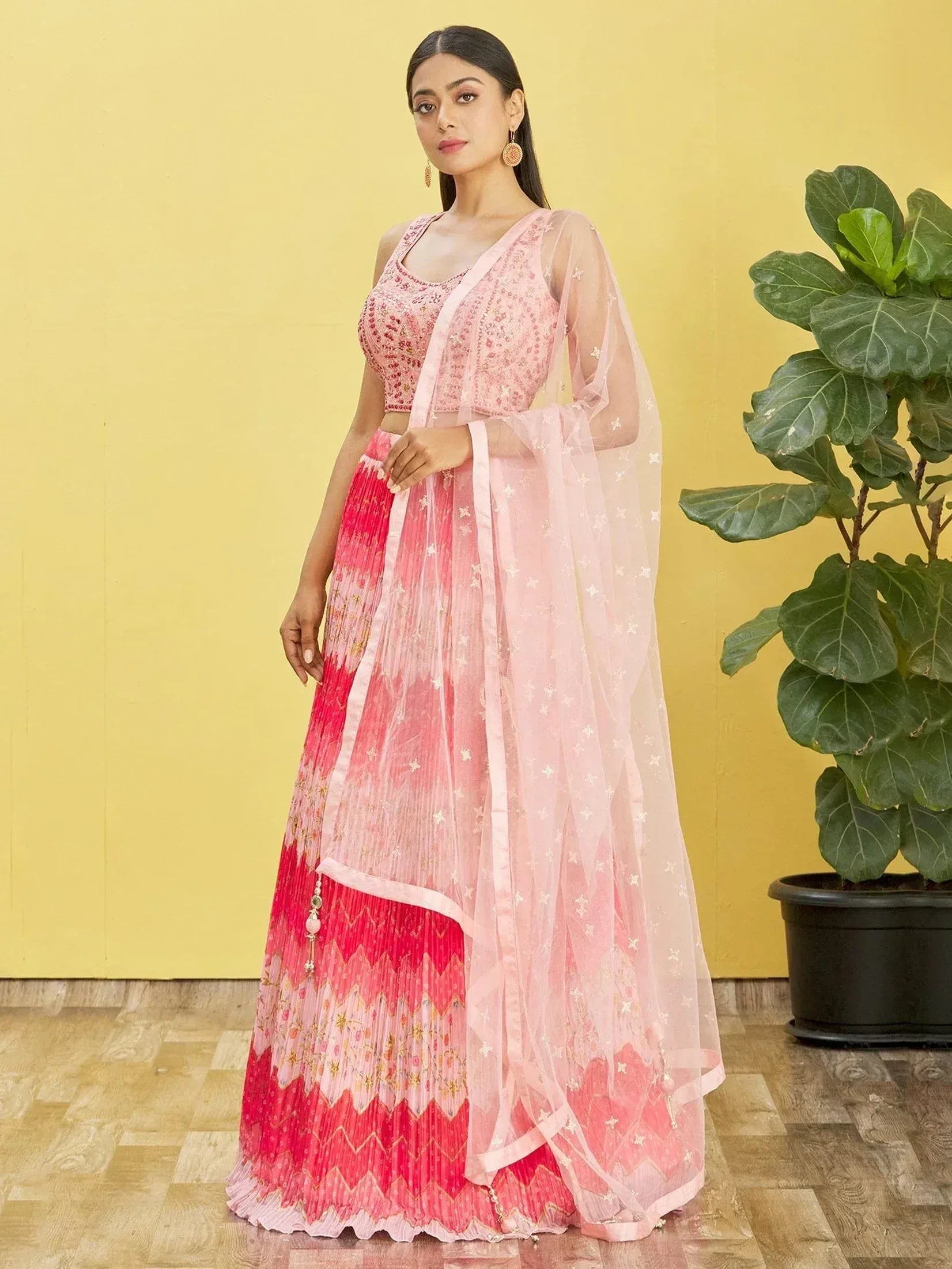 Pink embroidered lehenga choli with sheer dupatta, perfect for Indian ethnic wear and festive occasions.