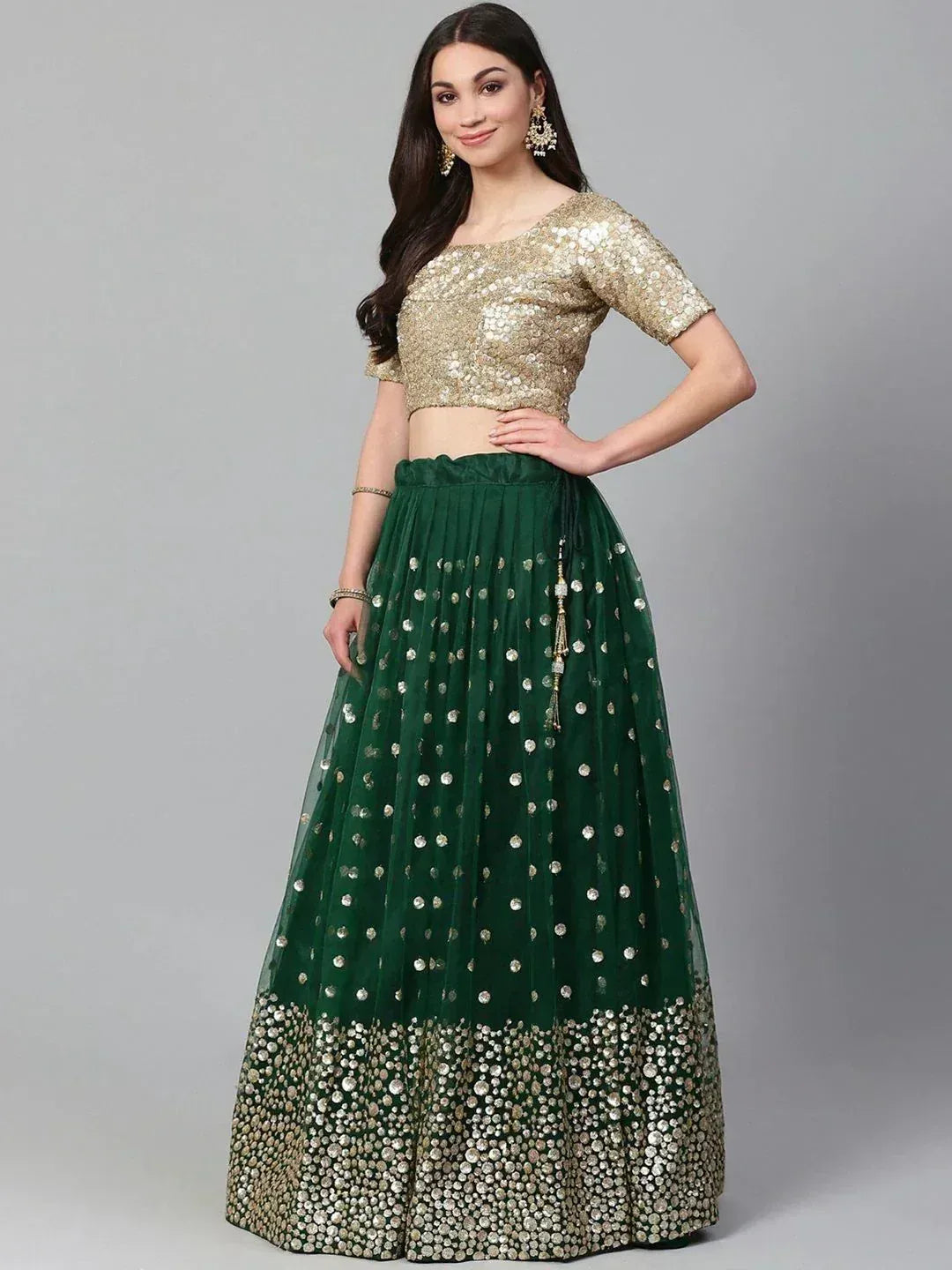 Green and gold sequin lehenga choli with embroidered skirt, perfect for Indian ethnic wear occasions