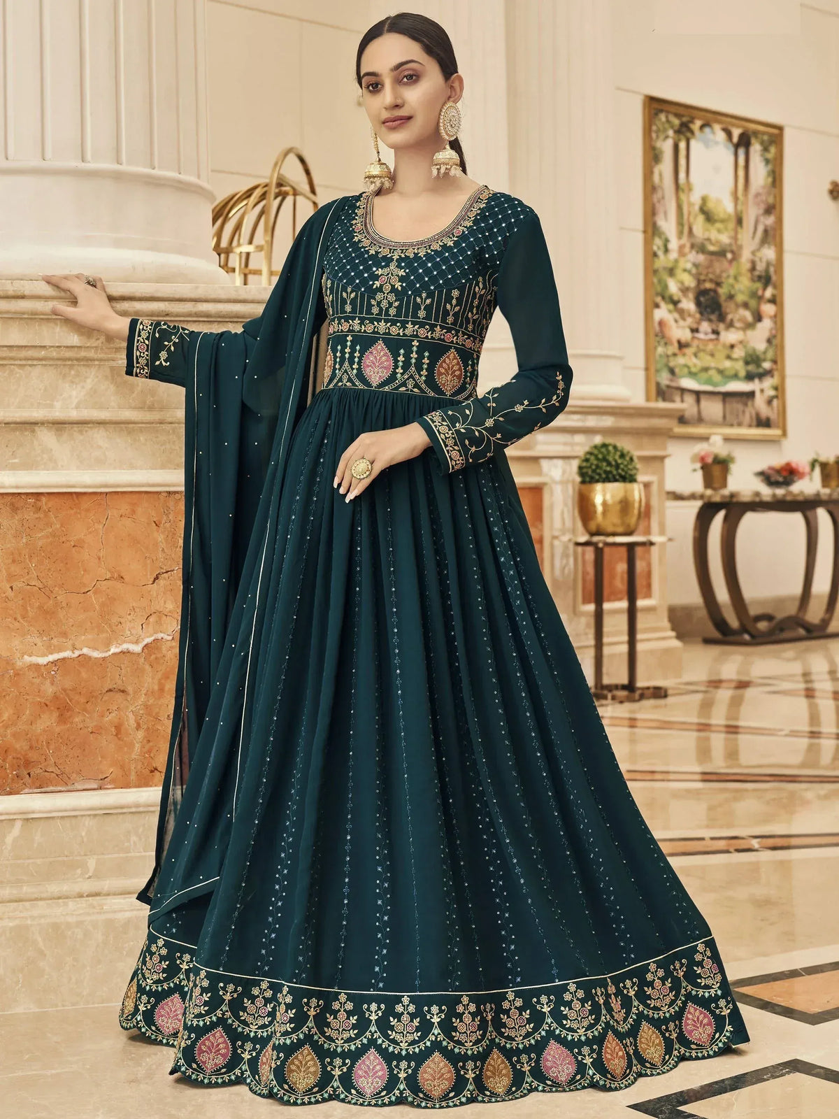 Elegant dark green embroidered anarkali suit with gold and pink detailing, perfect for Indian ethnic occasions