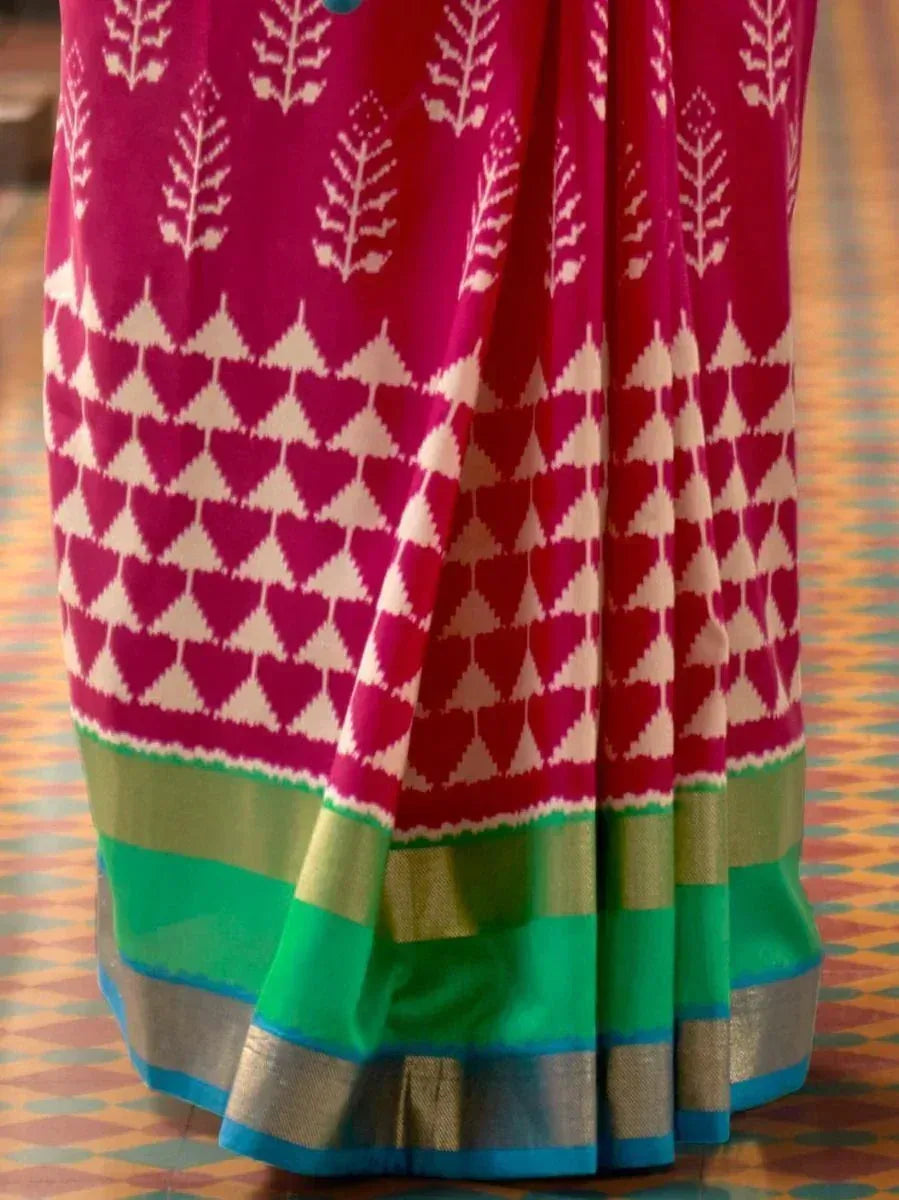 Pink and green ikat saree with geometric leaf print and silk border, ethnic wear