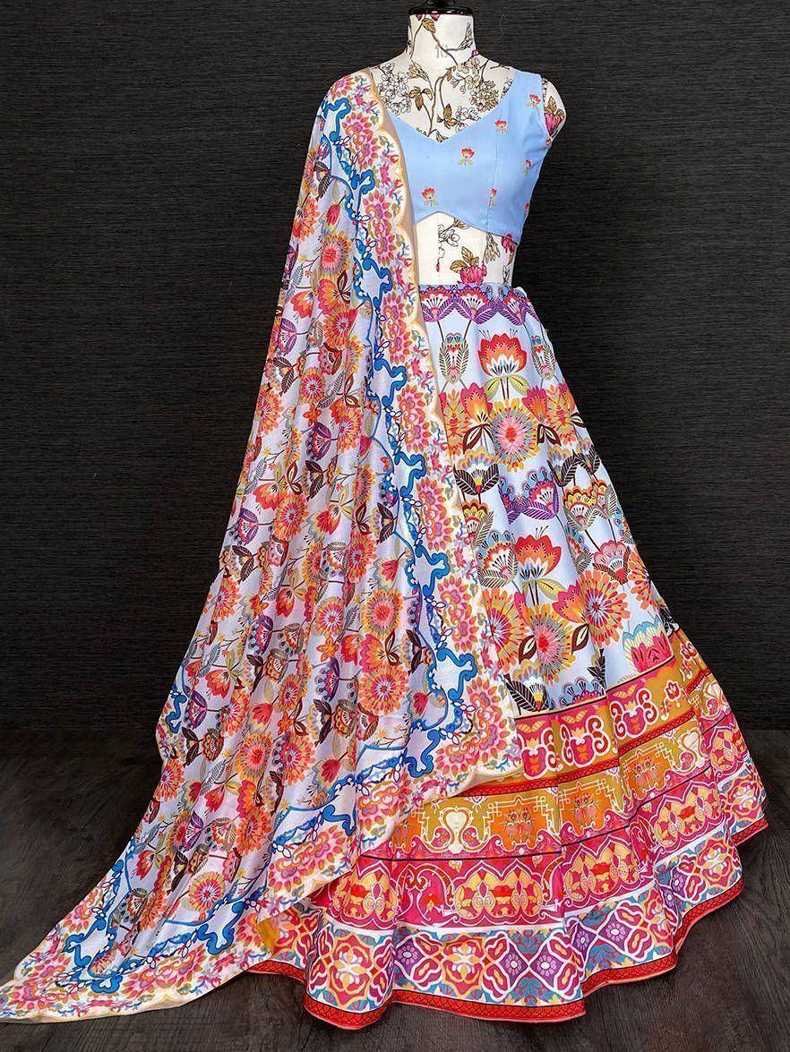 Vibrant floral lehenga choli with colorful border and matching dupatta, perfect for Indian ethnic wear.