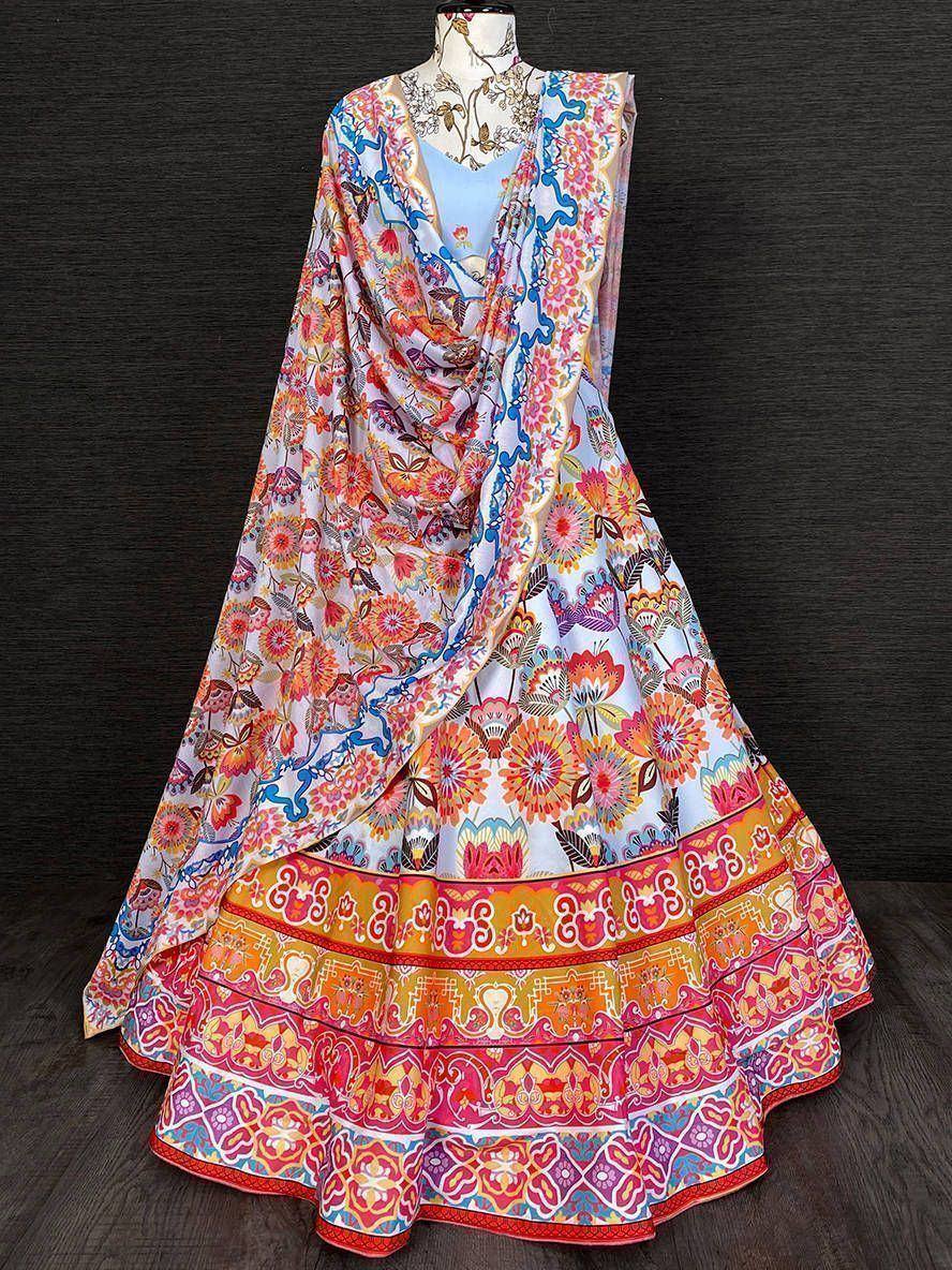 Vibrant floral lehenga choli with colorful border designs, perfect for Indian ethnic wear.