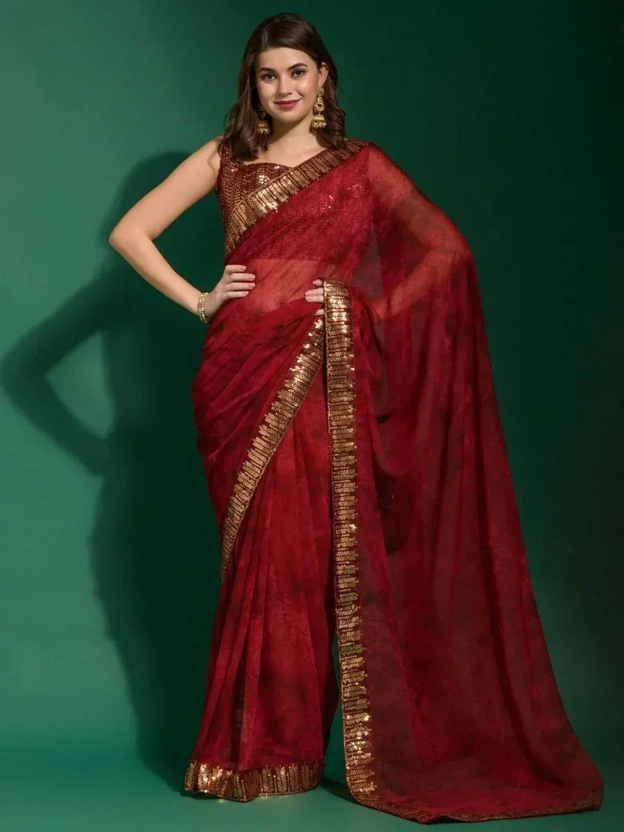 Red ethnic saree with gold sequin border and matching blouse, perfect for Indian weddings and festive occasions