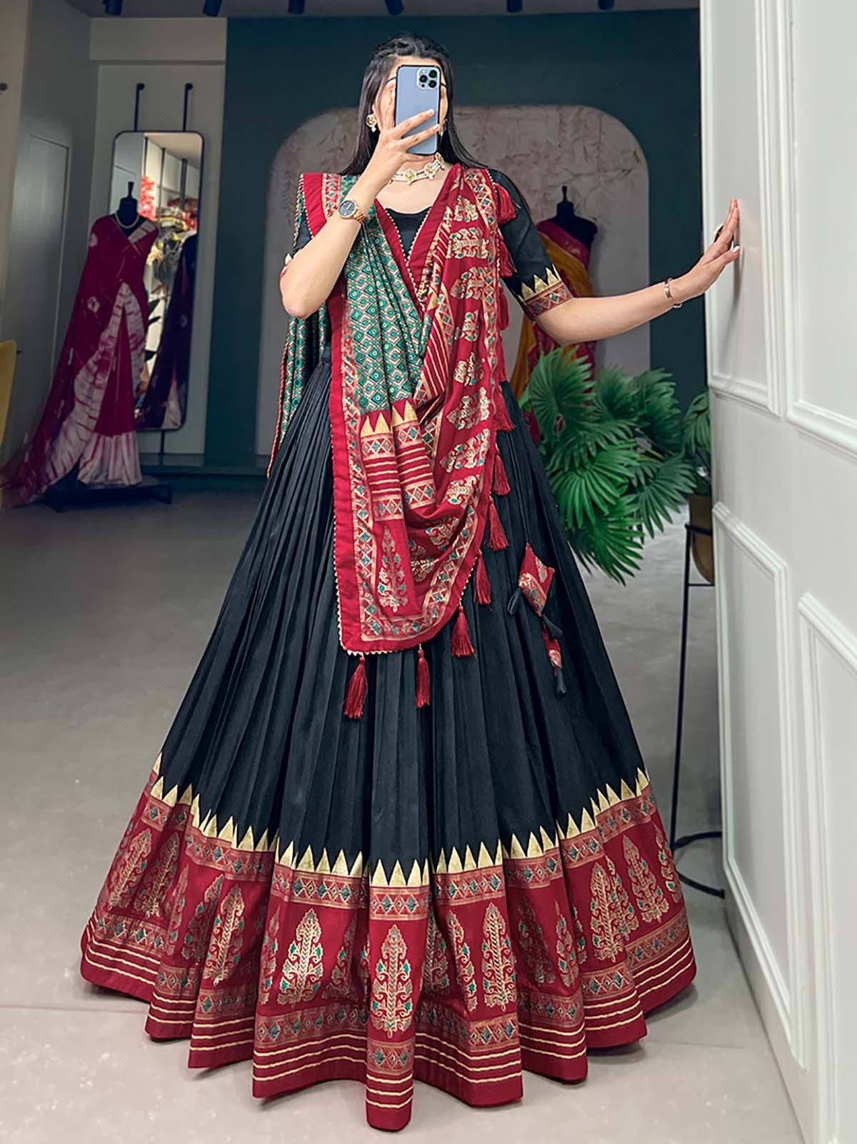 Black and red ethnic lehenga choli with embroidered dupatta, perfect for Indian weddings and festivals