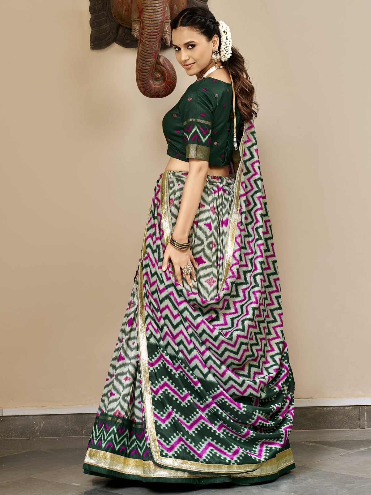 Noteworthy Green Ikkat Printed Silk Mehendi Wear Lehenga Choli