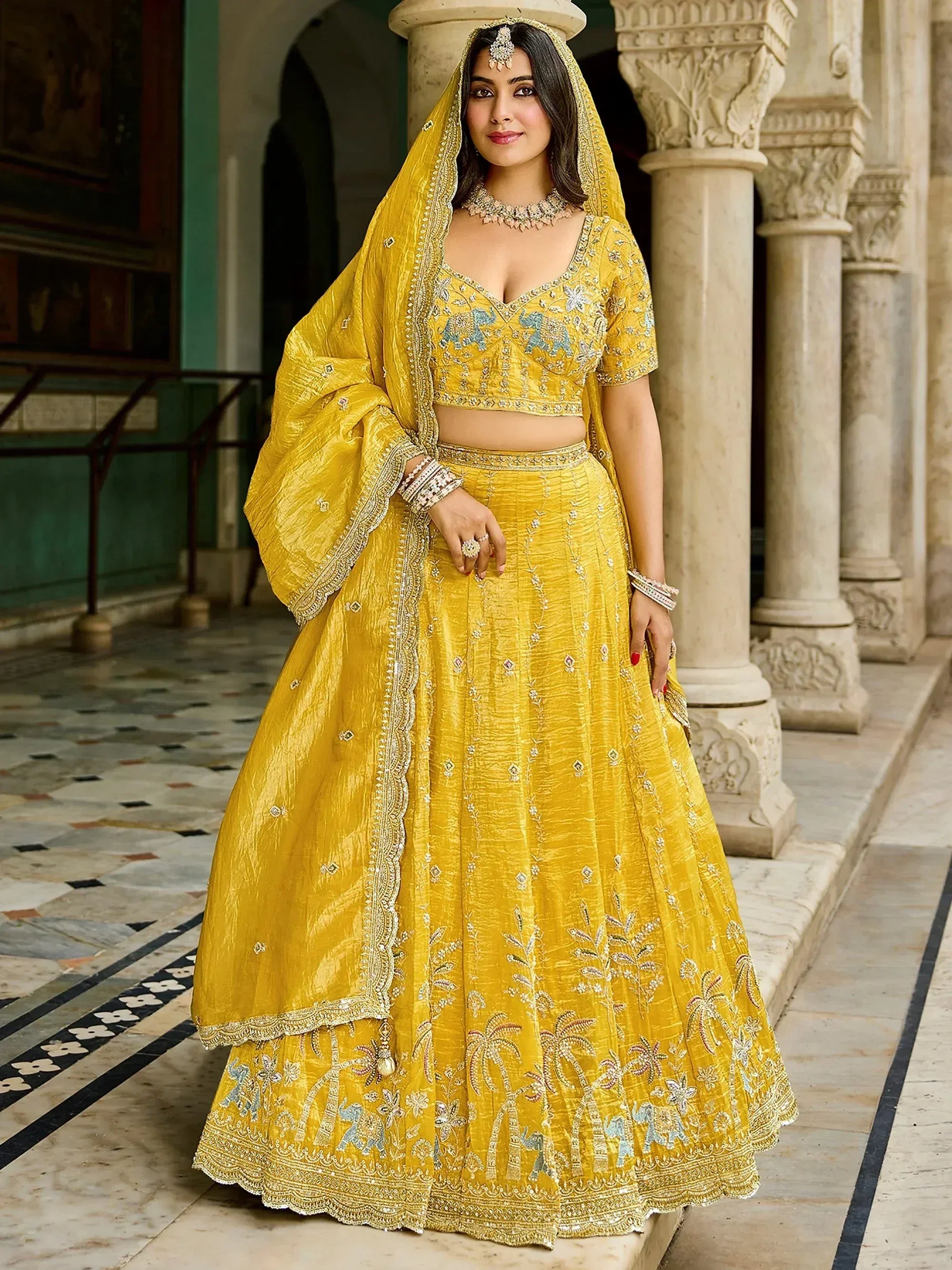 Pretty Yellow Embroidered Crush Wedding Wear Lehenga Choli