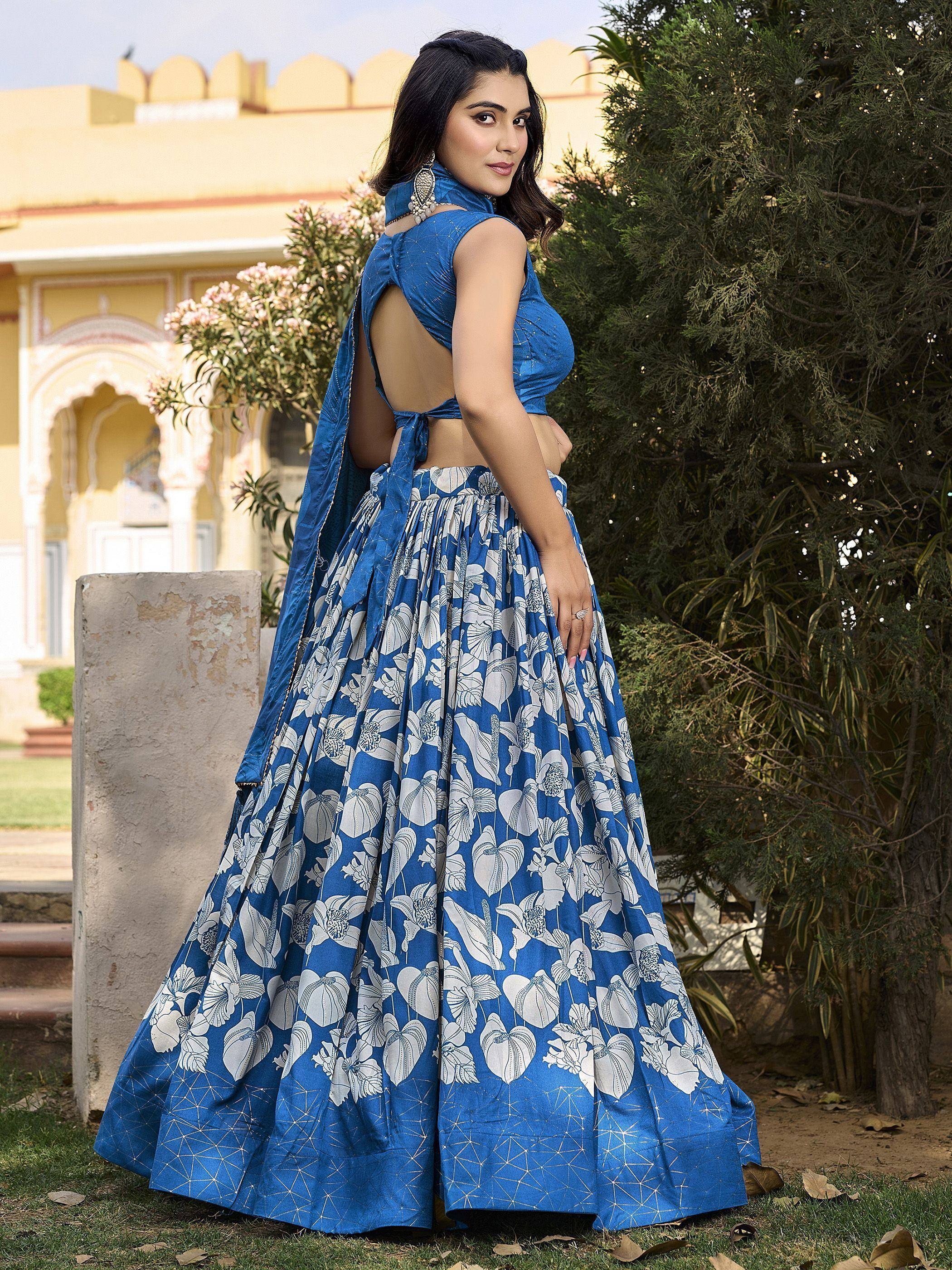Blue floral lehenga choli with backless blouse, perfect for Indian ethnic wear occasions