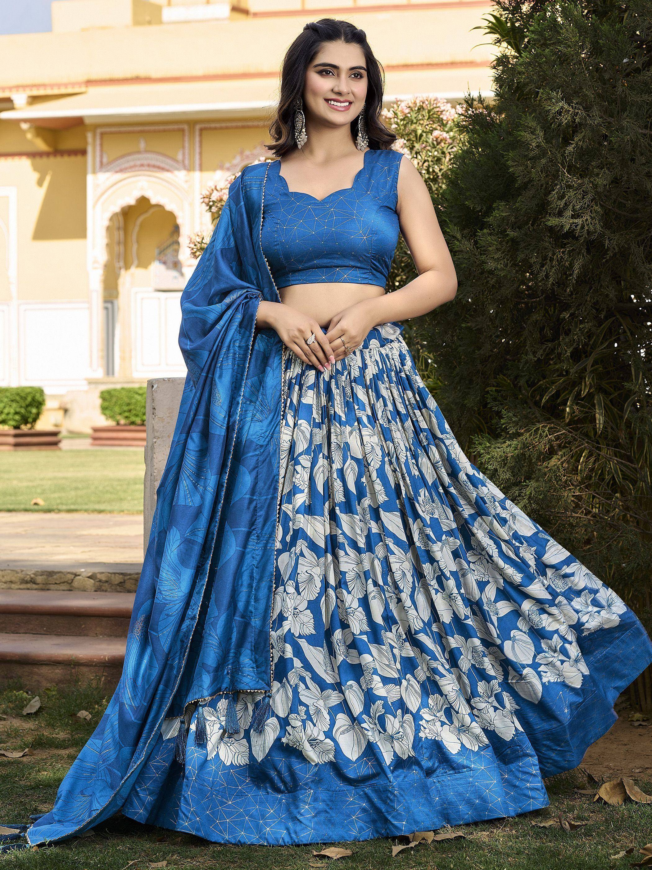 Blue floral lehenga choli with geometric patterns, perfect for ethnic occasions