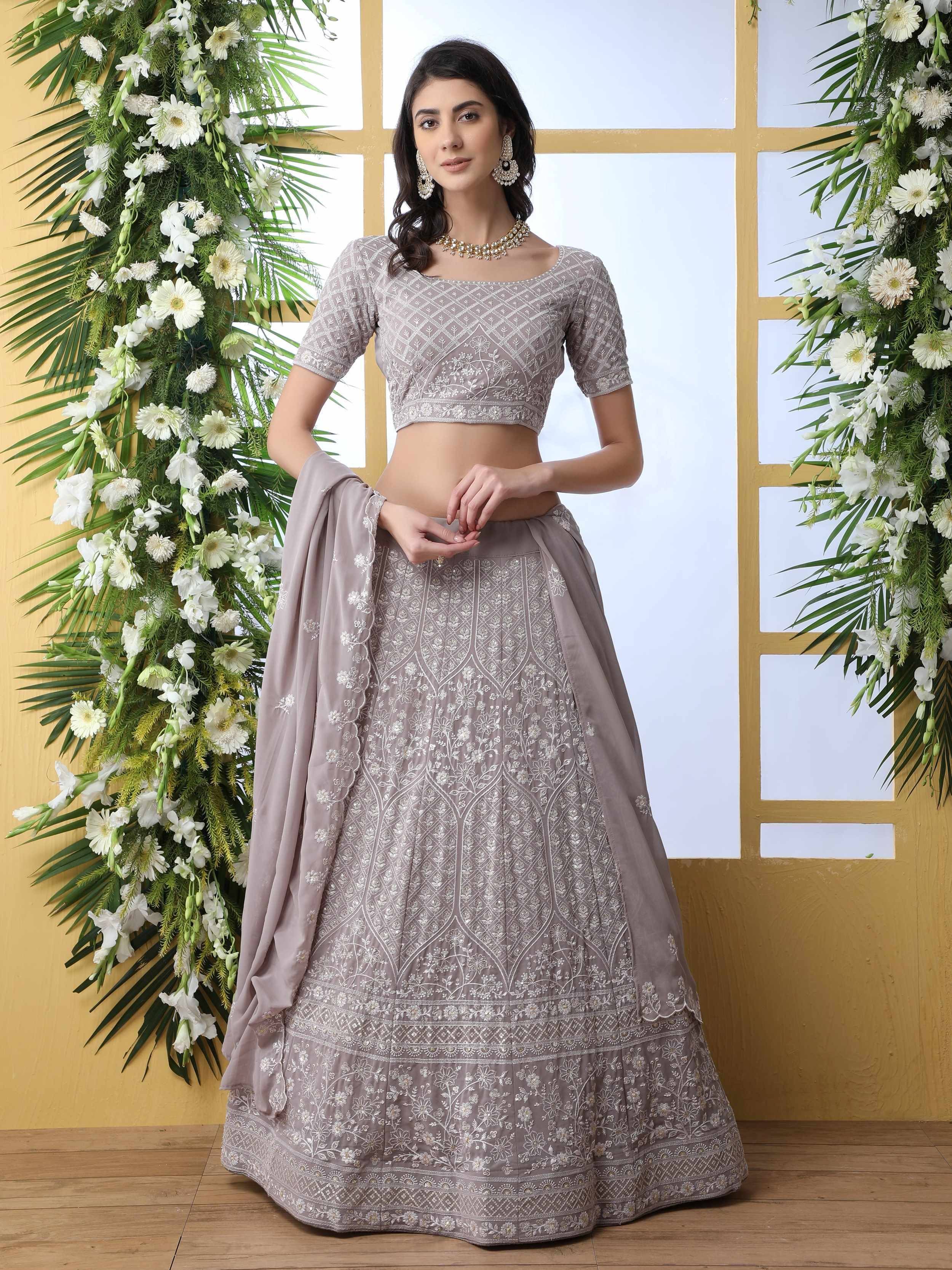 Elegant grey embroidered lehenga choli with floral detailing, perfect for Indian ethnic occasions