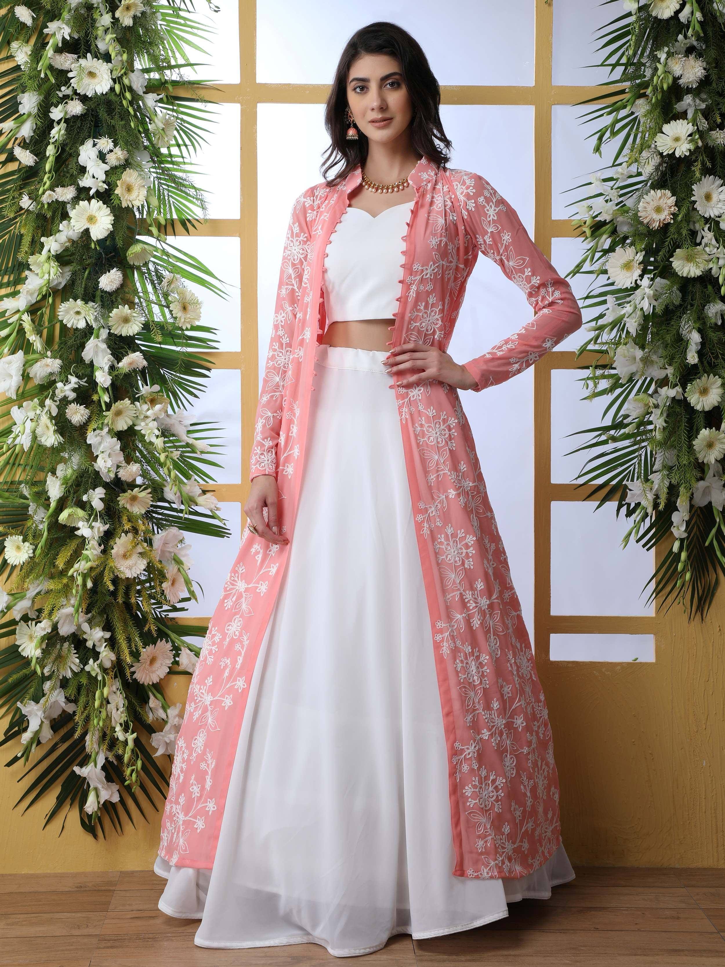 White lehenga choli with pink floral embroidered jacket, perfect for Indian ethnic wear occasions
