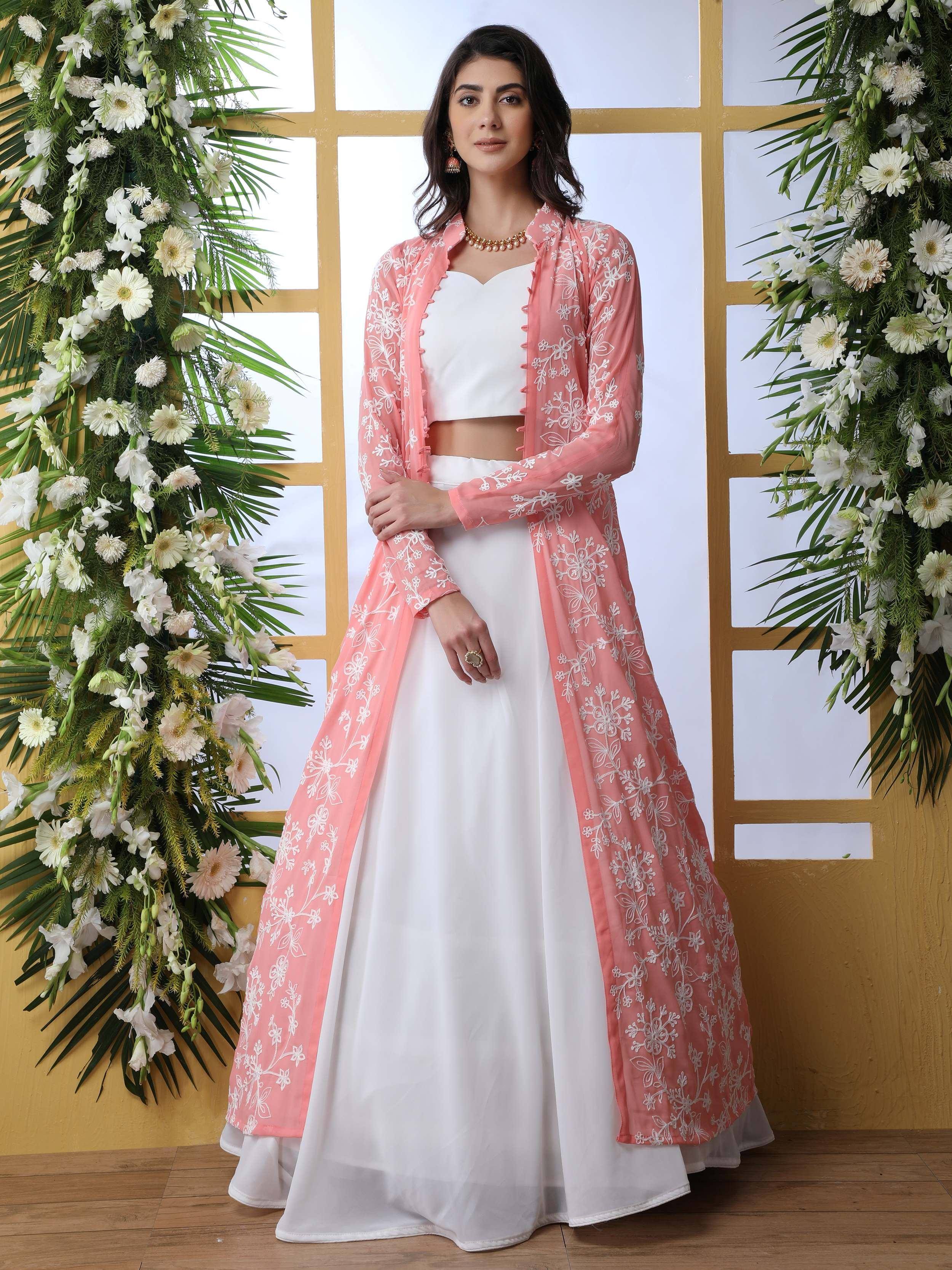 White lehenga with peach floral embroidered jacket, perfect for Indian ethnic wear events