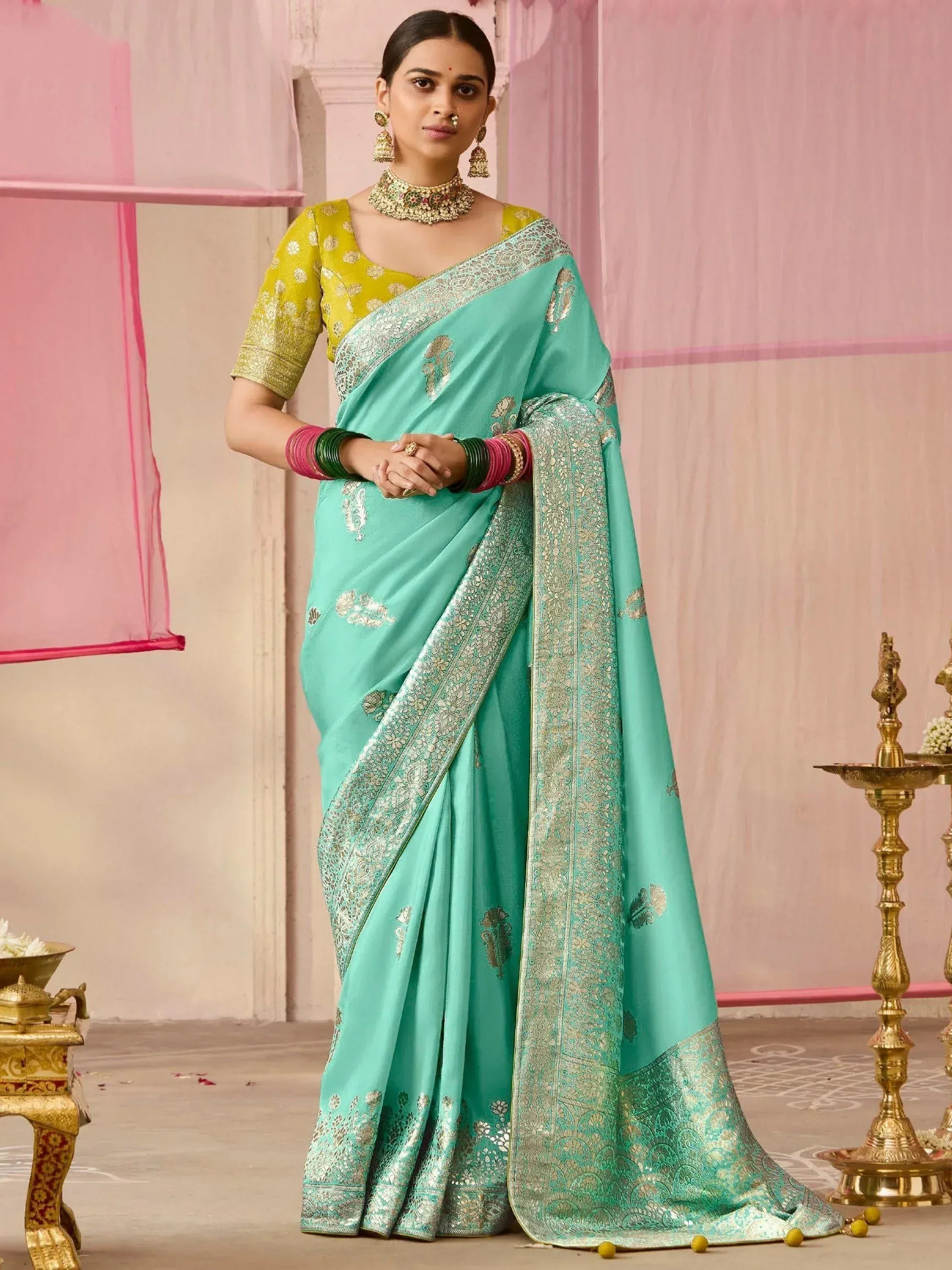 Mint green saree with gold embroidery and yellow blouse, traditional Indian ethnic wear