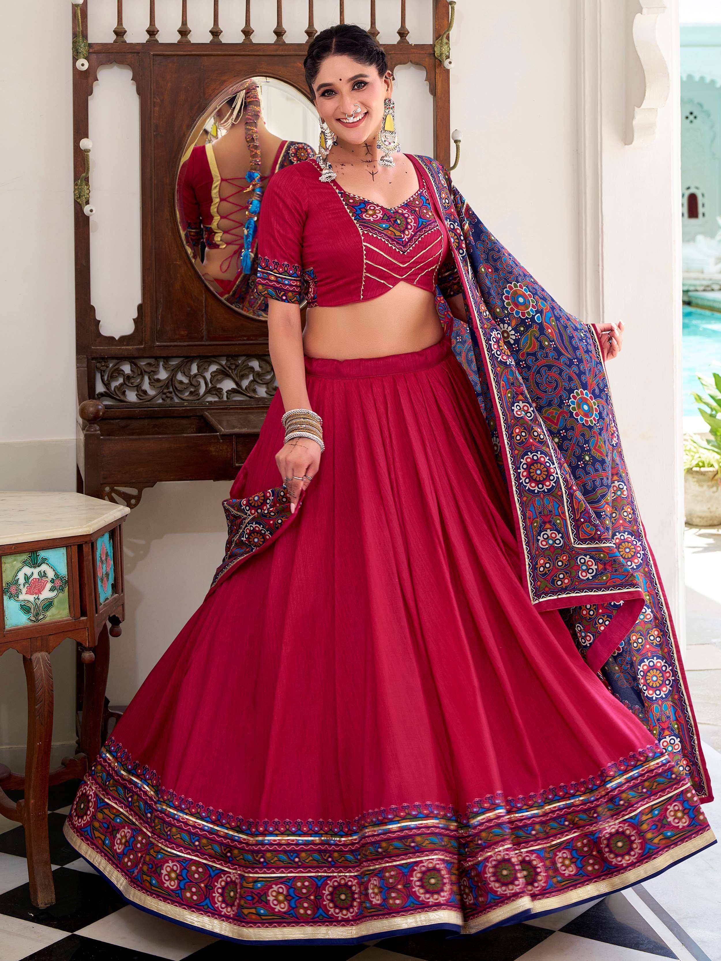 Red embroidered lehenga choli with blue floral dupatta, traditional Indian ethnic wear for women
