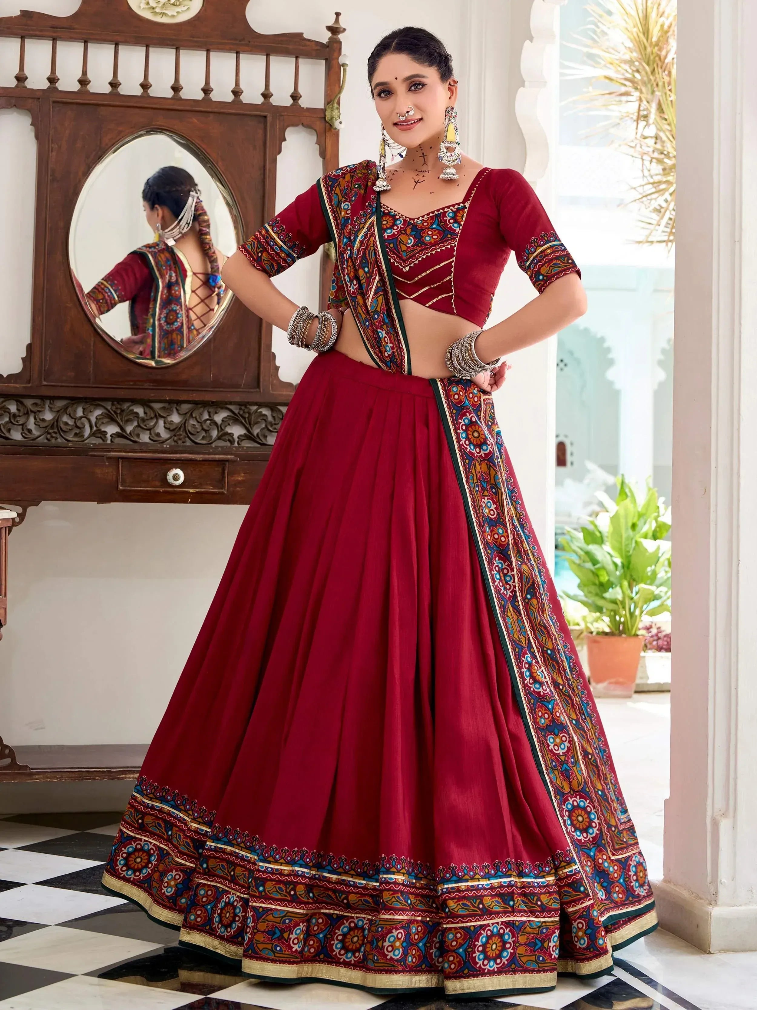 Maroon ethnic lehenga choli with colorful printed dupatta, perfect for Indian weddings and festivals