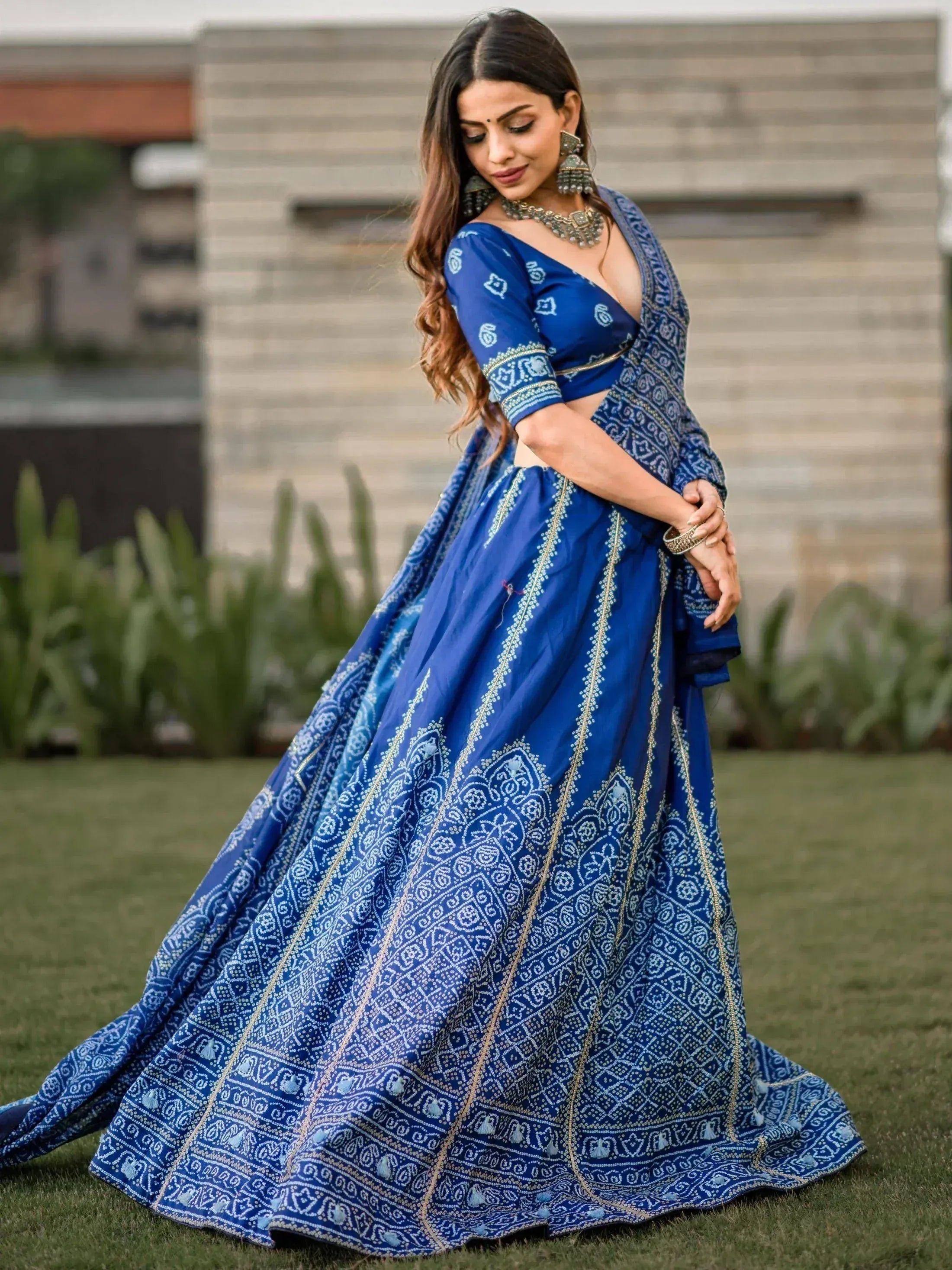 Blue printed lehenga choli with gold embroidery, perfect for Indian ethnic wear occasions