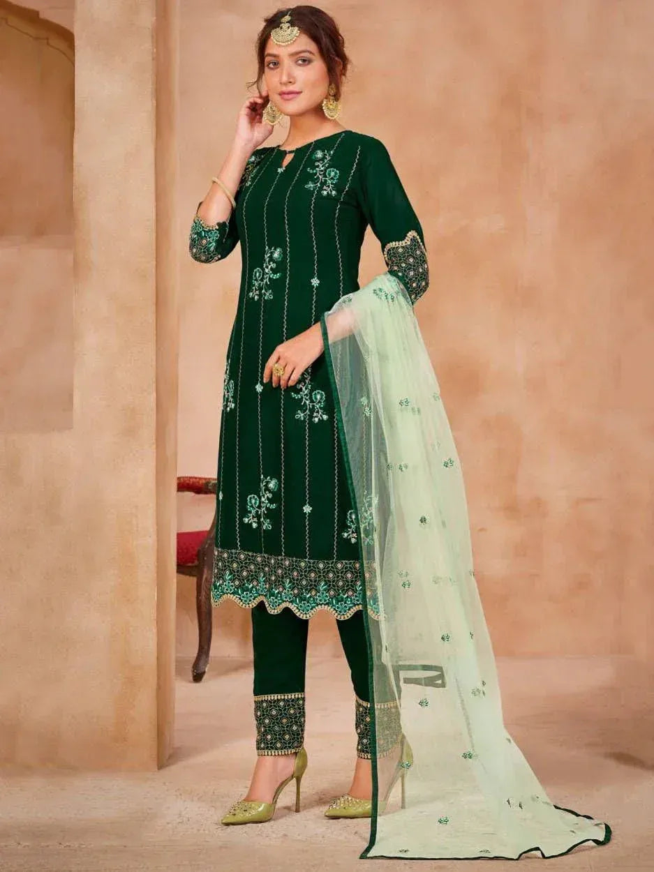 Emerald green embroidered salwar kameez with sheer dupatta, perfect for ethnic occasions