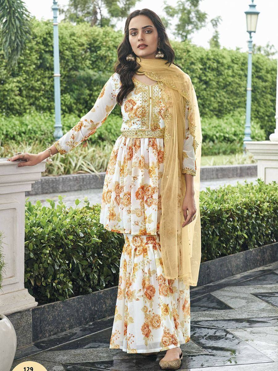 White floral printed salwar kameez with gold embroidery and dupatta, ethnic Indian wear