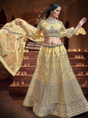 Fascinating Yellow Sequins Embroidered Net Wedding Wear Lehenga Choli