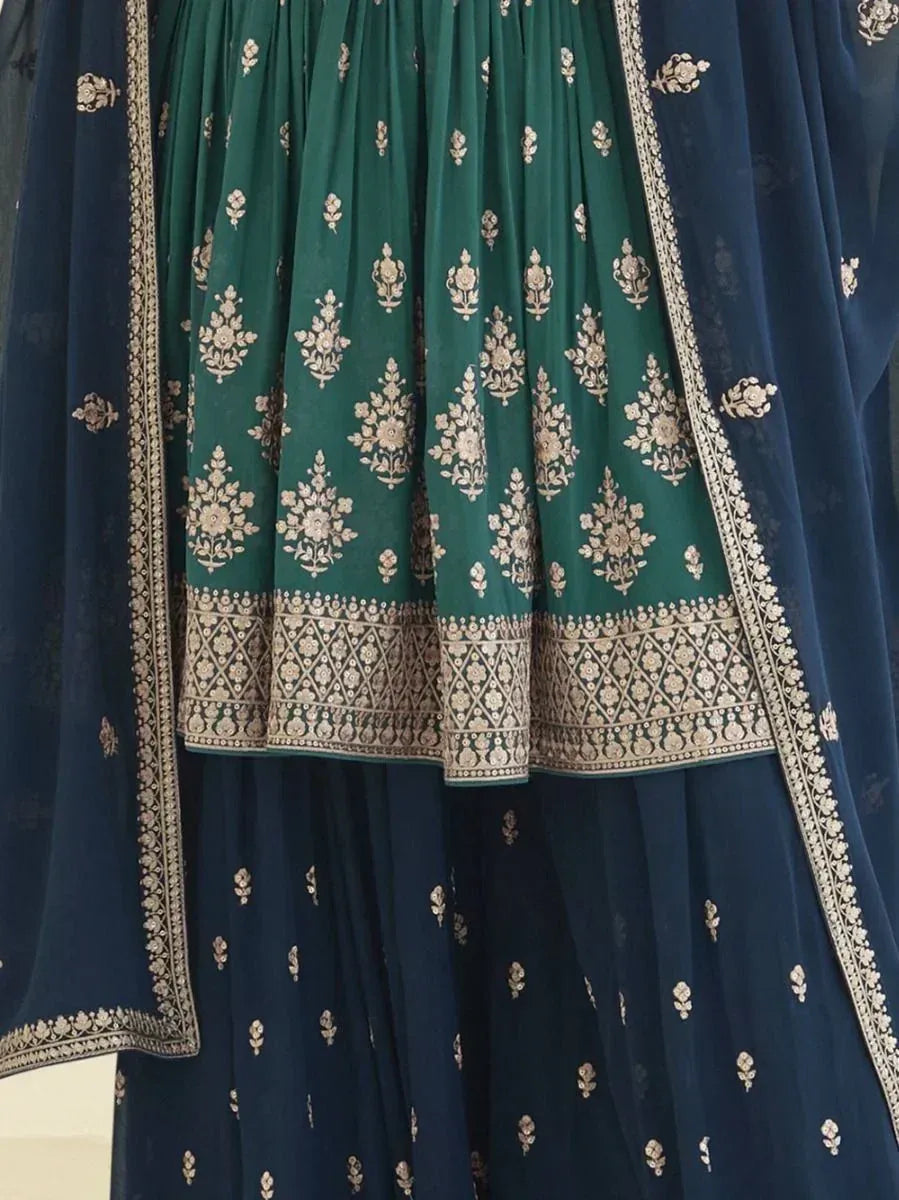 Green and navy blue designer lehenga with gold embroidery and floral motifs