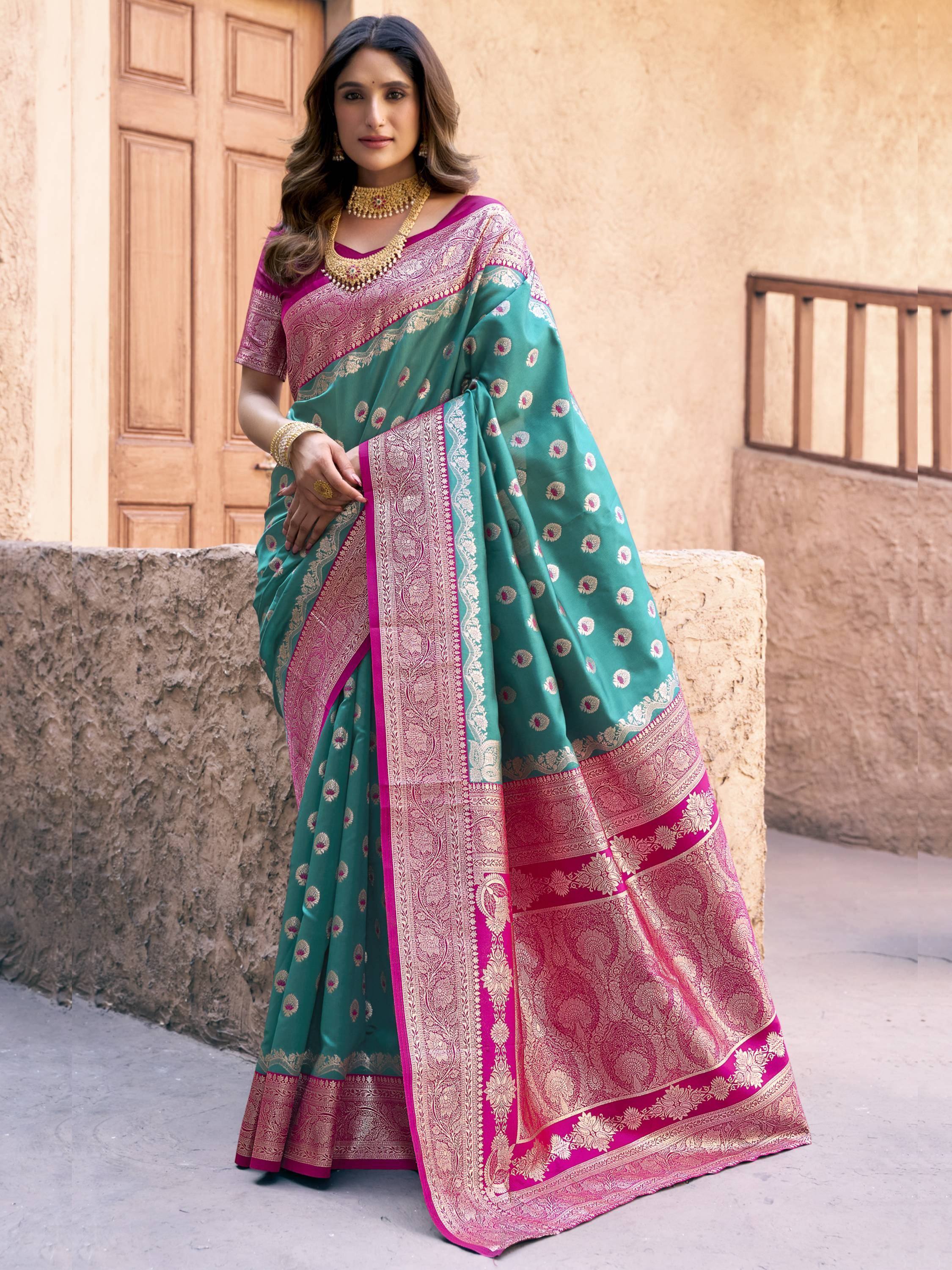Teal and magenta designer saree with gold zari work, perfect for Indian ethnic occasions