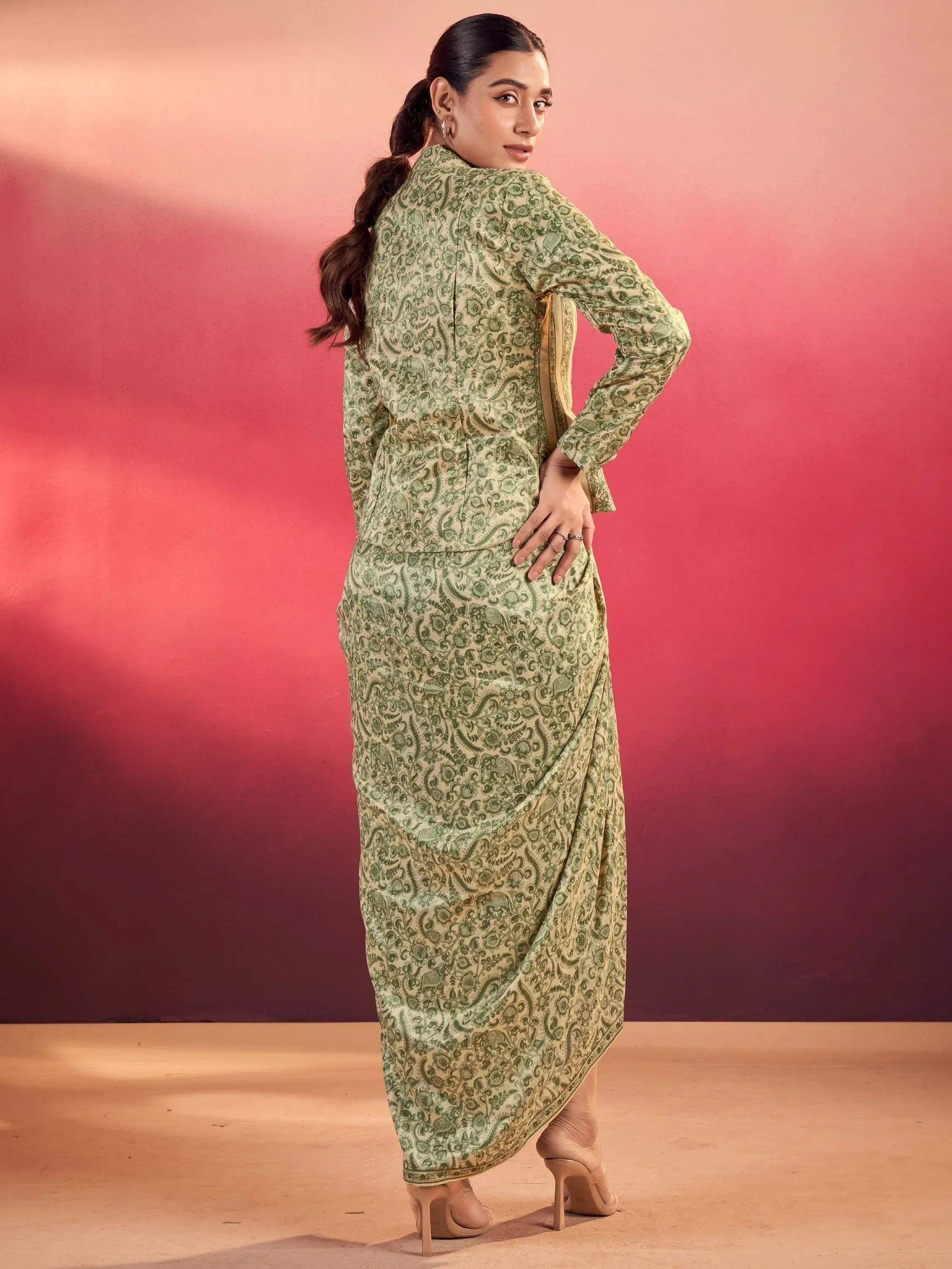 Charming Green Mehendi Wear Crop Top With Draped Lehenga And Jacket