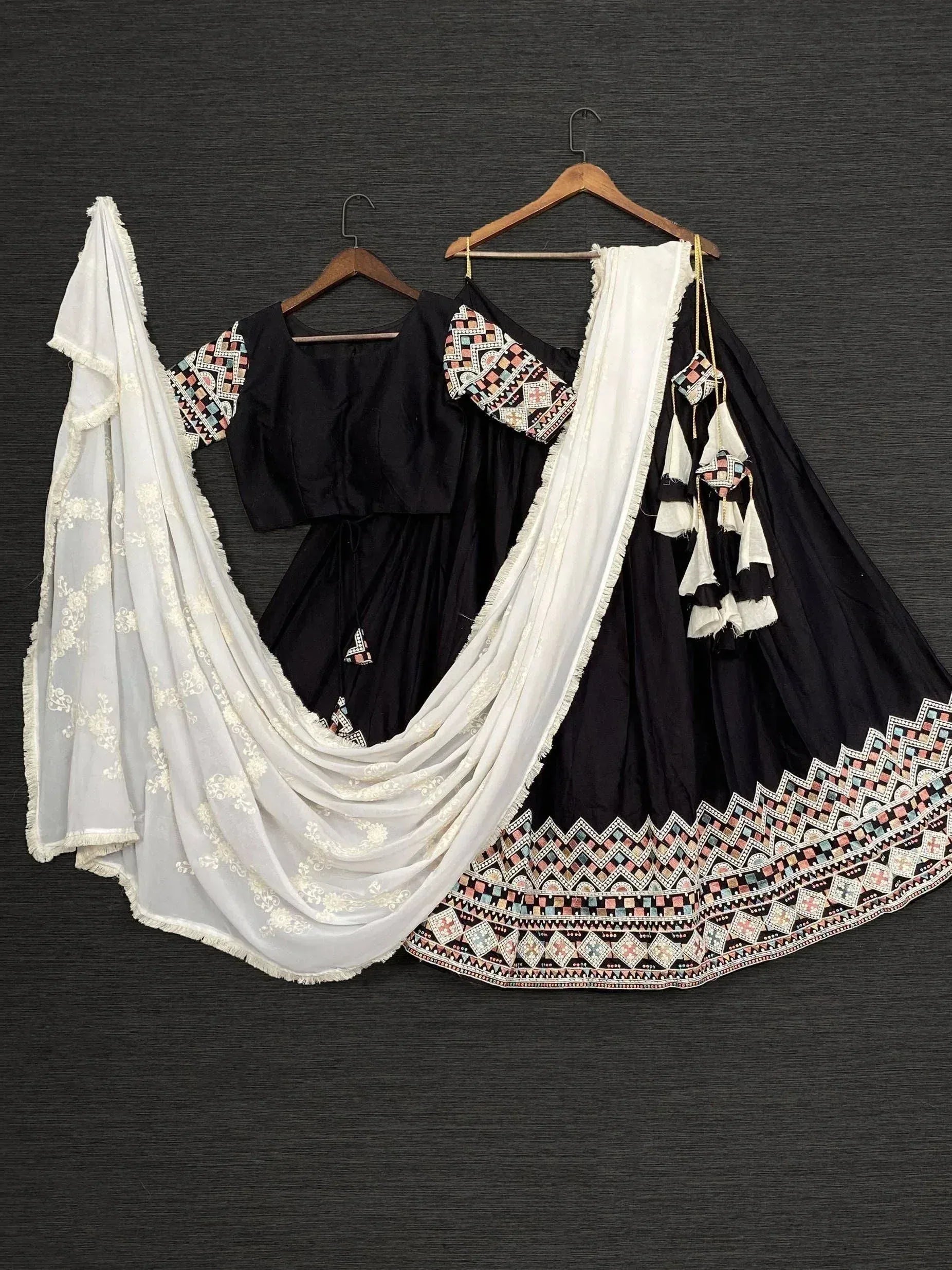 Black embroidered lehenga choli with white dupatta, ethnic Indian wear for women