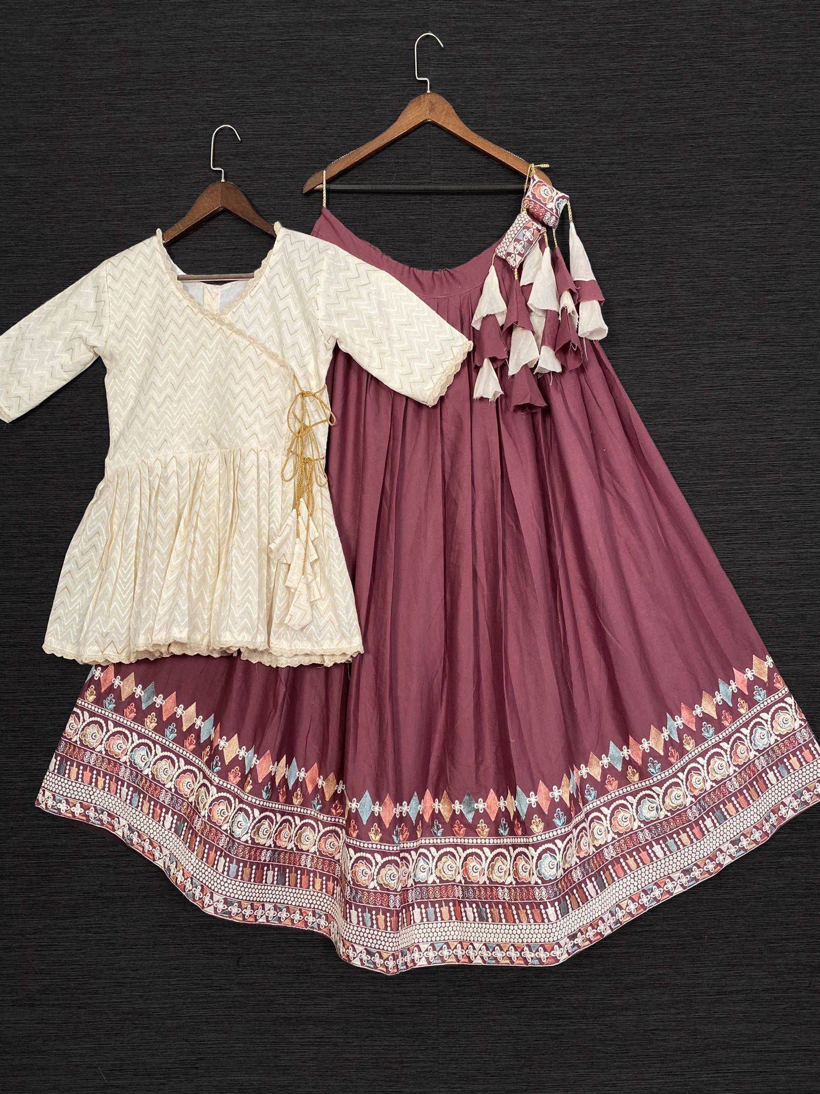 White chevron top with maroon printed skirt, ethnic Indian wear set on hangers