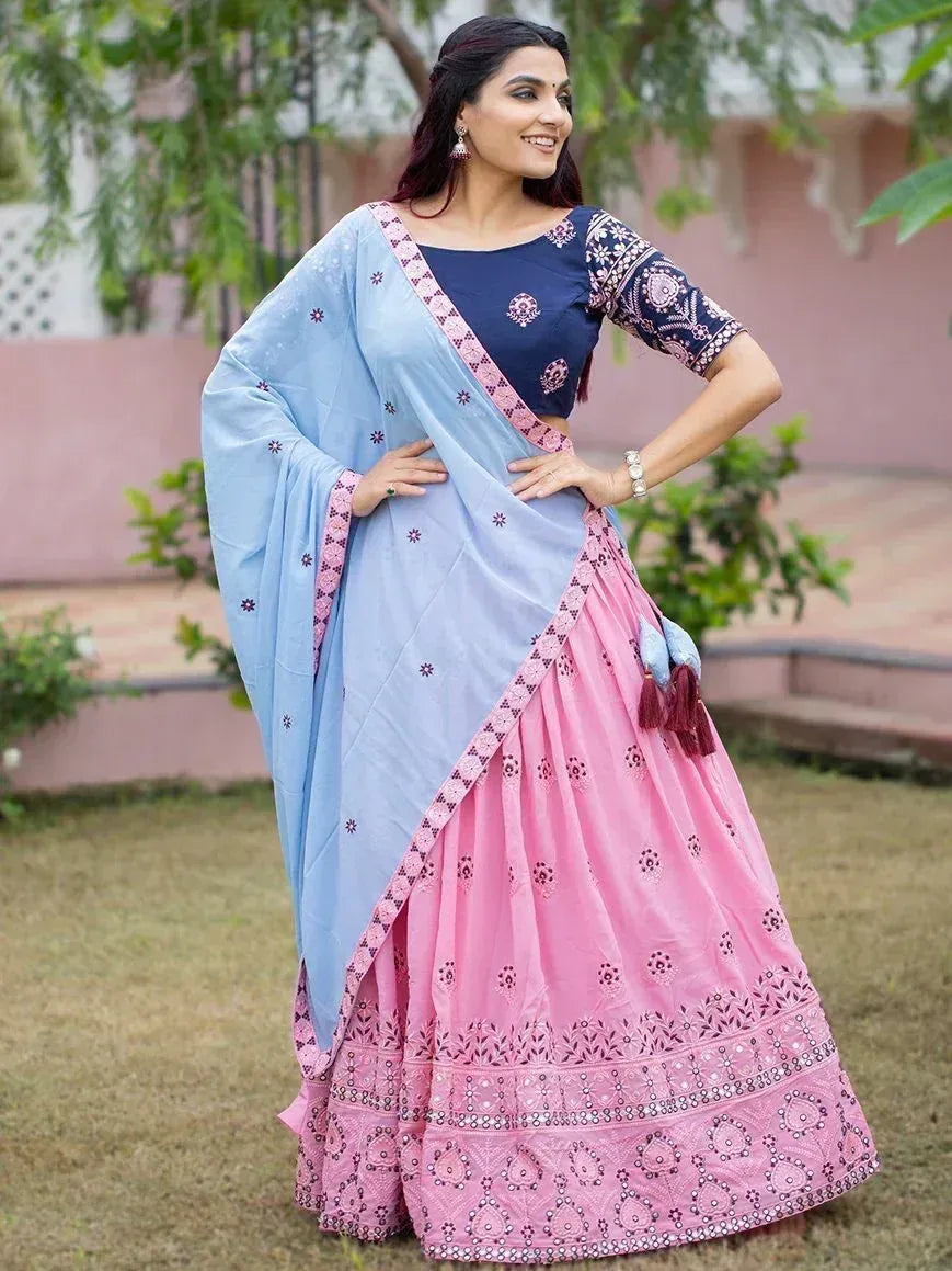 Pink and blue embroidered lehenga choli with mirror work, perfect for Indian ethnic occasions