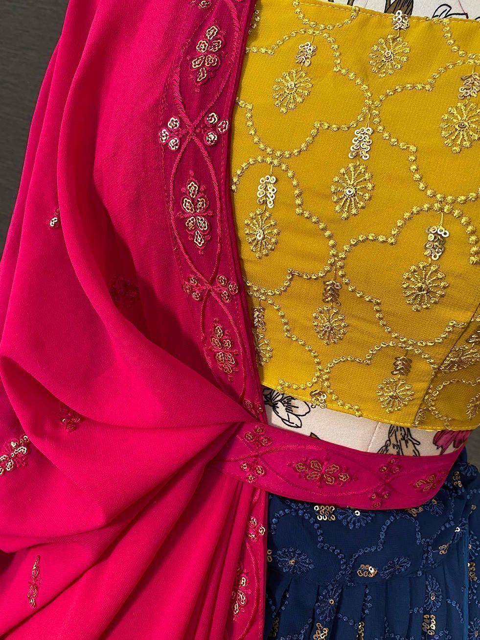 Yellow embroidered blouse with pink dupatta and blue lehenga, Indian ethnic wear