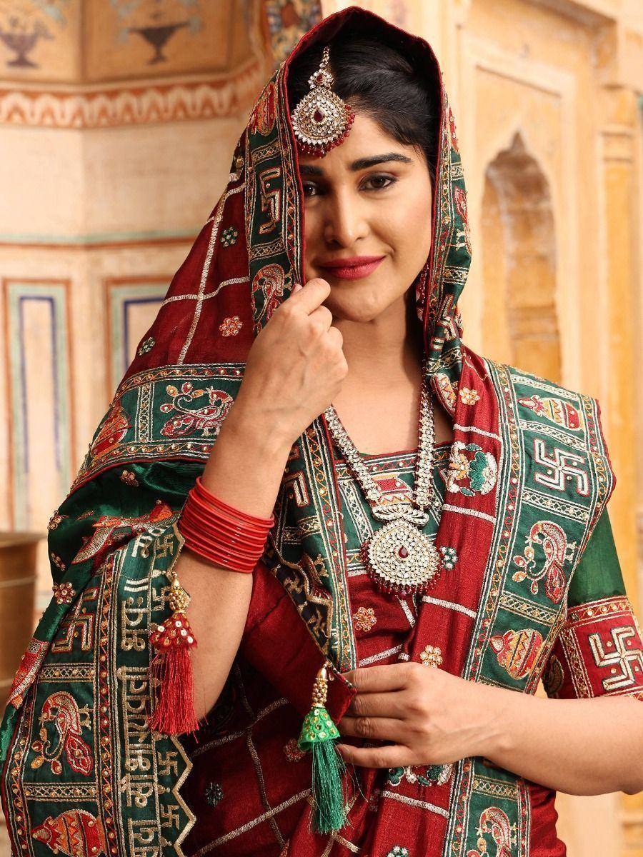 Fascinating Red Embroidered Silk Wedding Wear Panetar Saree With Blouse
